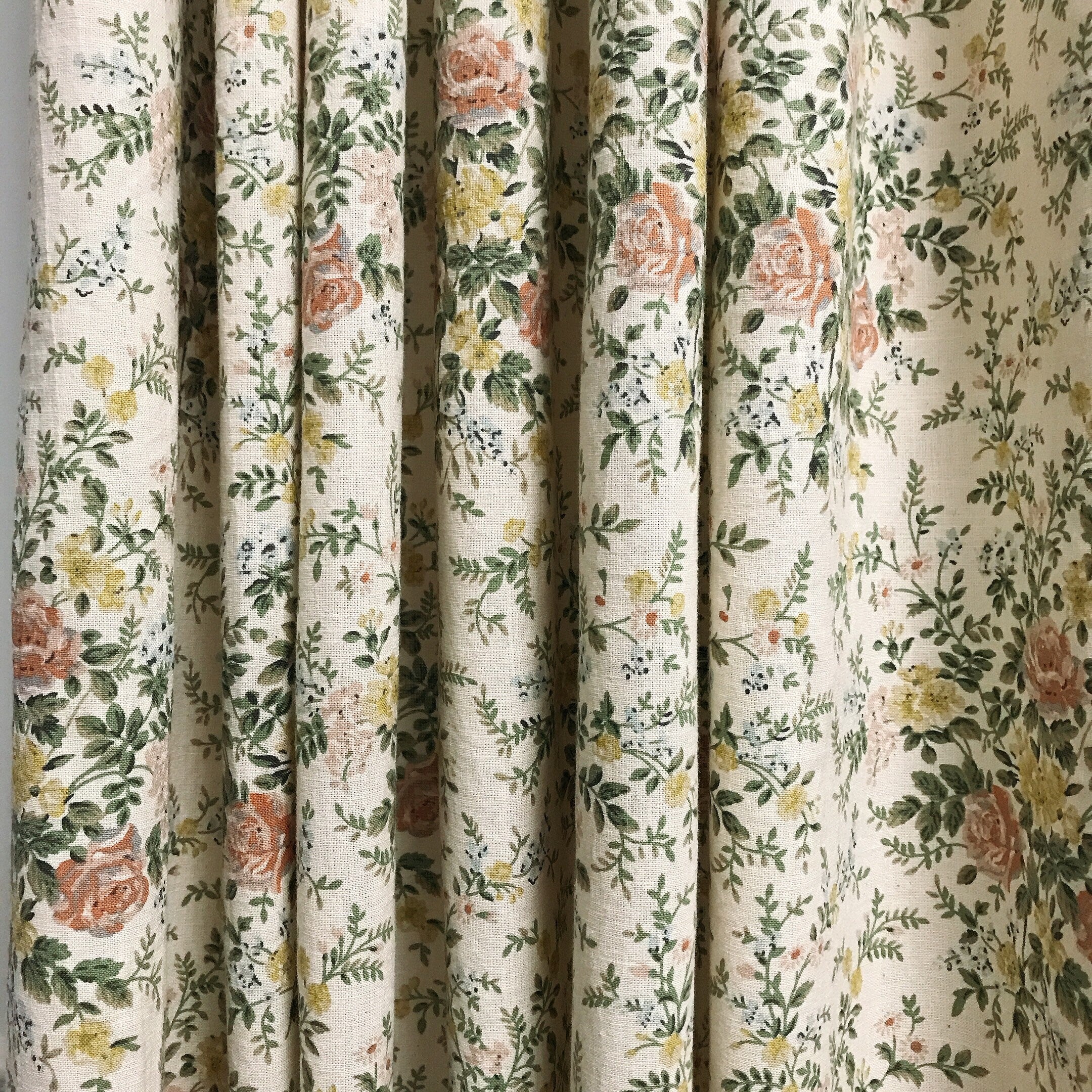 Toned Down Pink Floral Curtain on Natural Beige