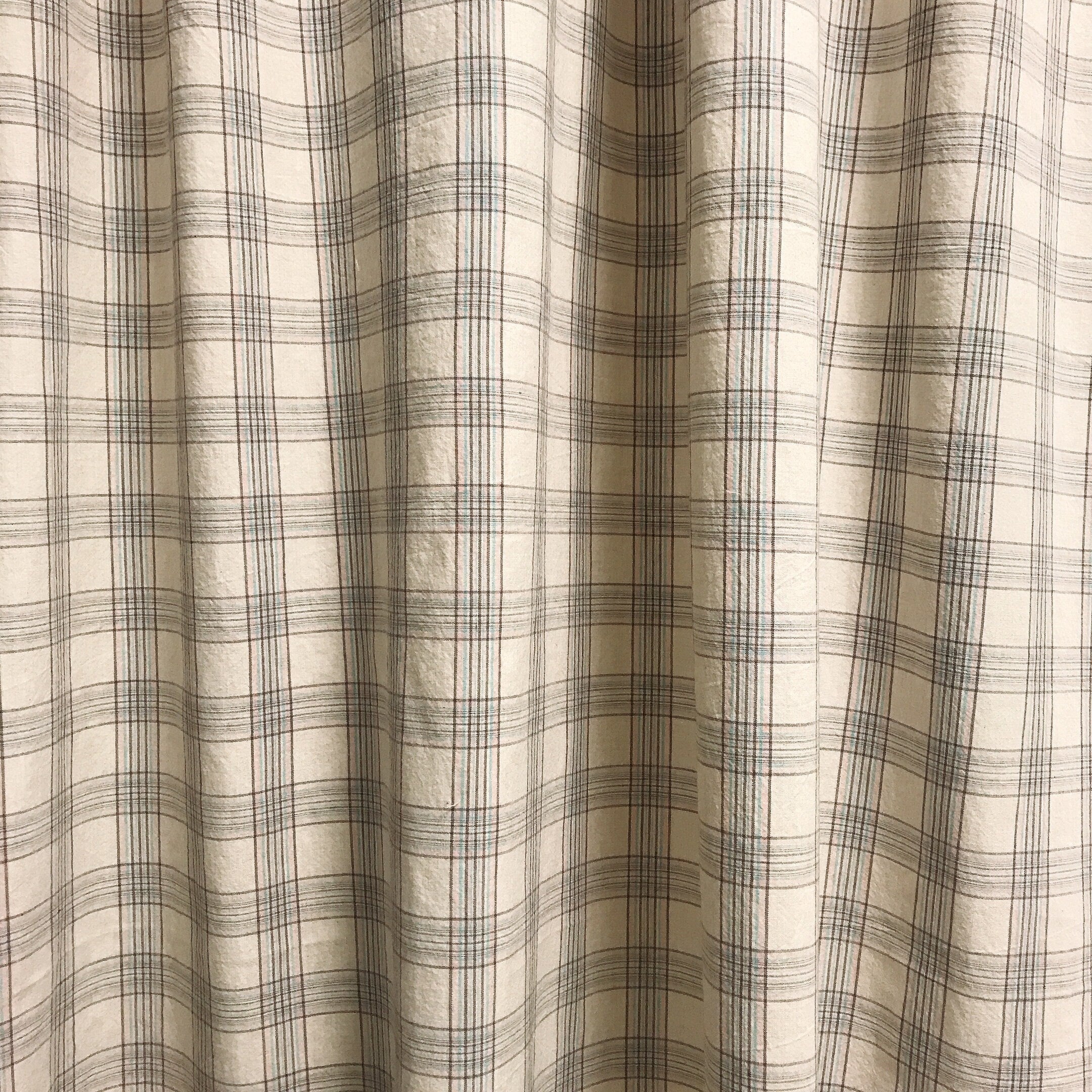 Brown Pink and Mint Plaid Curtain on Natural Beige