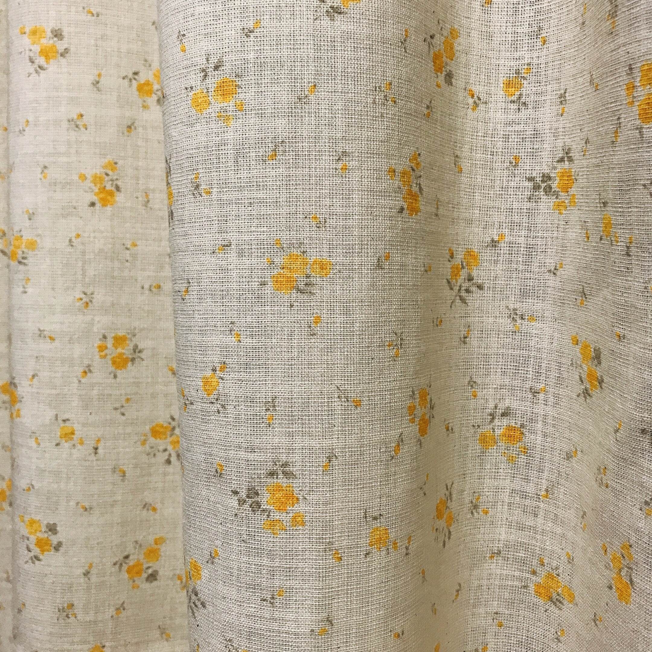 Pale Orange Yellow Floral Curtain on Natural Beige