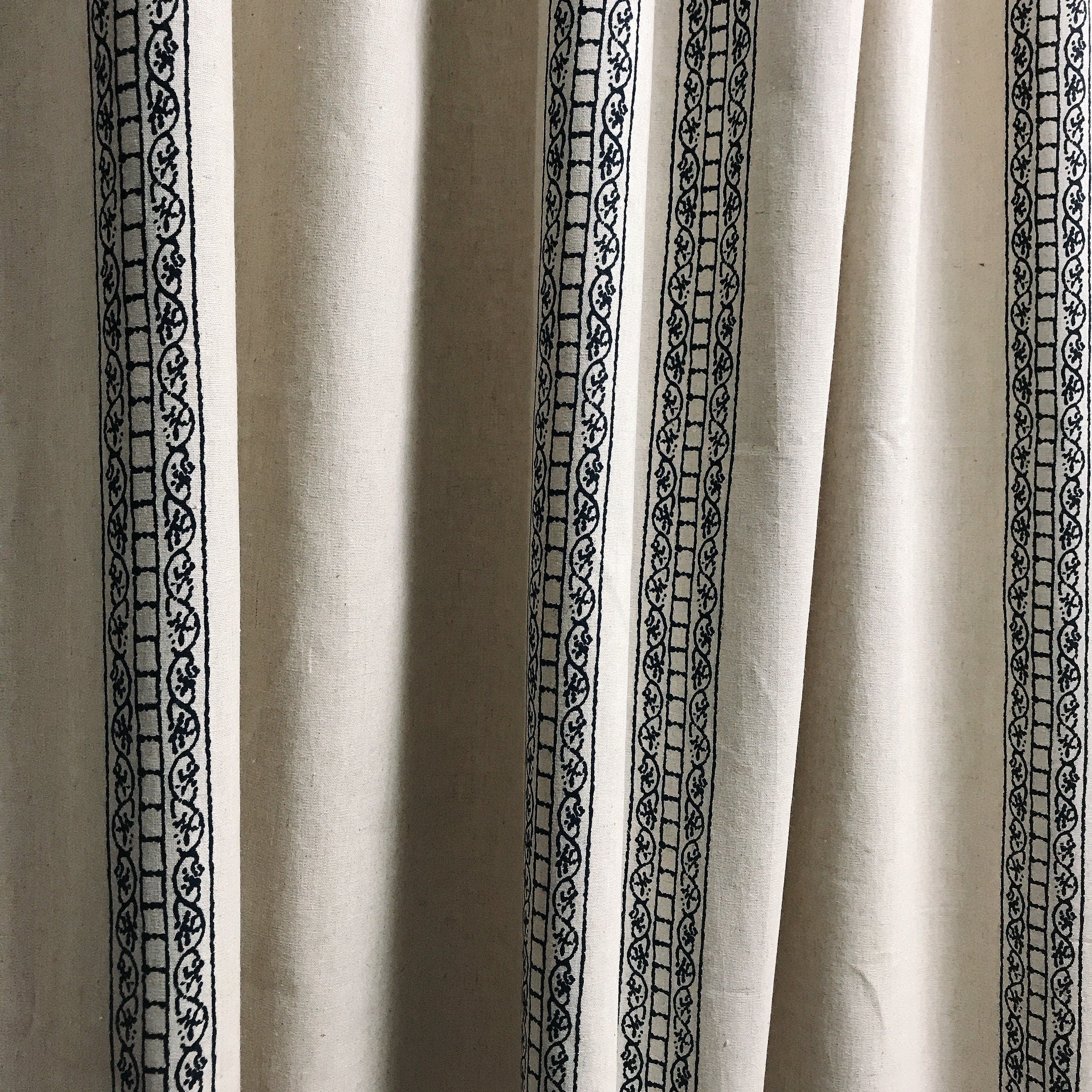 Navy Blue Motif Curtain on Natural Beige
