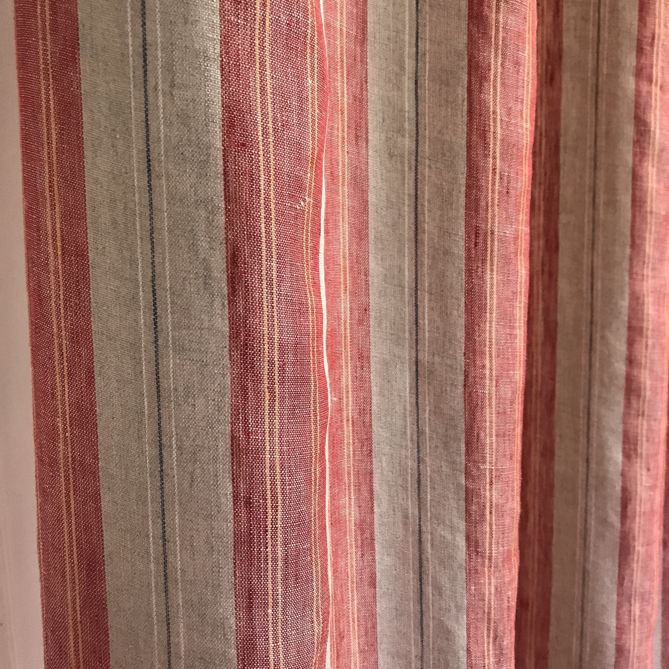 Red and Yellow Vertical Stripe Linen Curtain on Natural Beige with Orange Accents