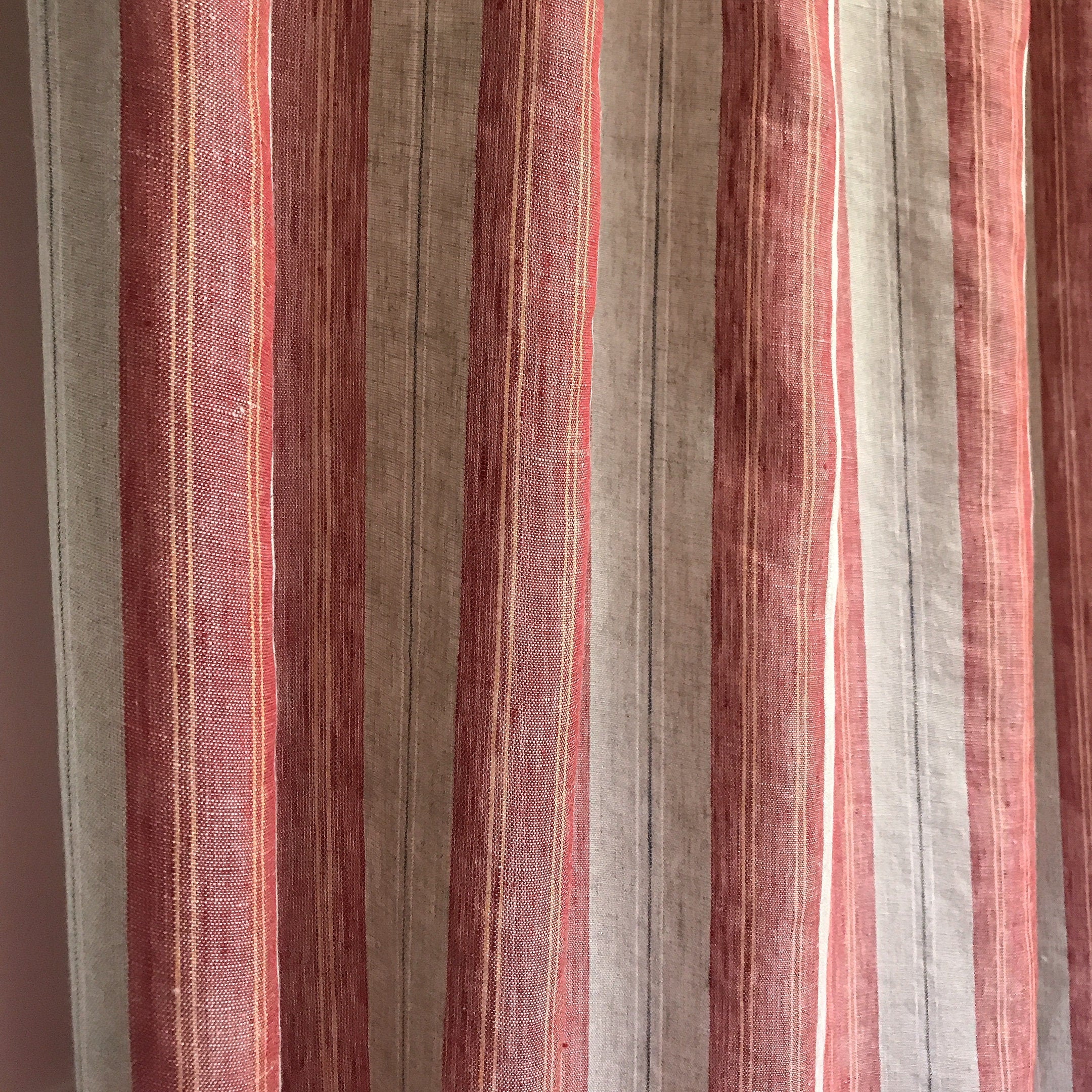 Red and Yellow Vertical Stripe Linen Curtain on Natural Beige with Orange Accents