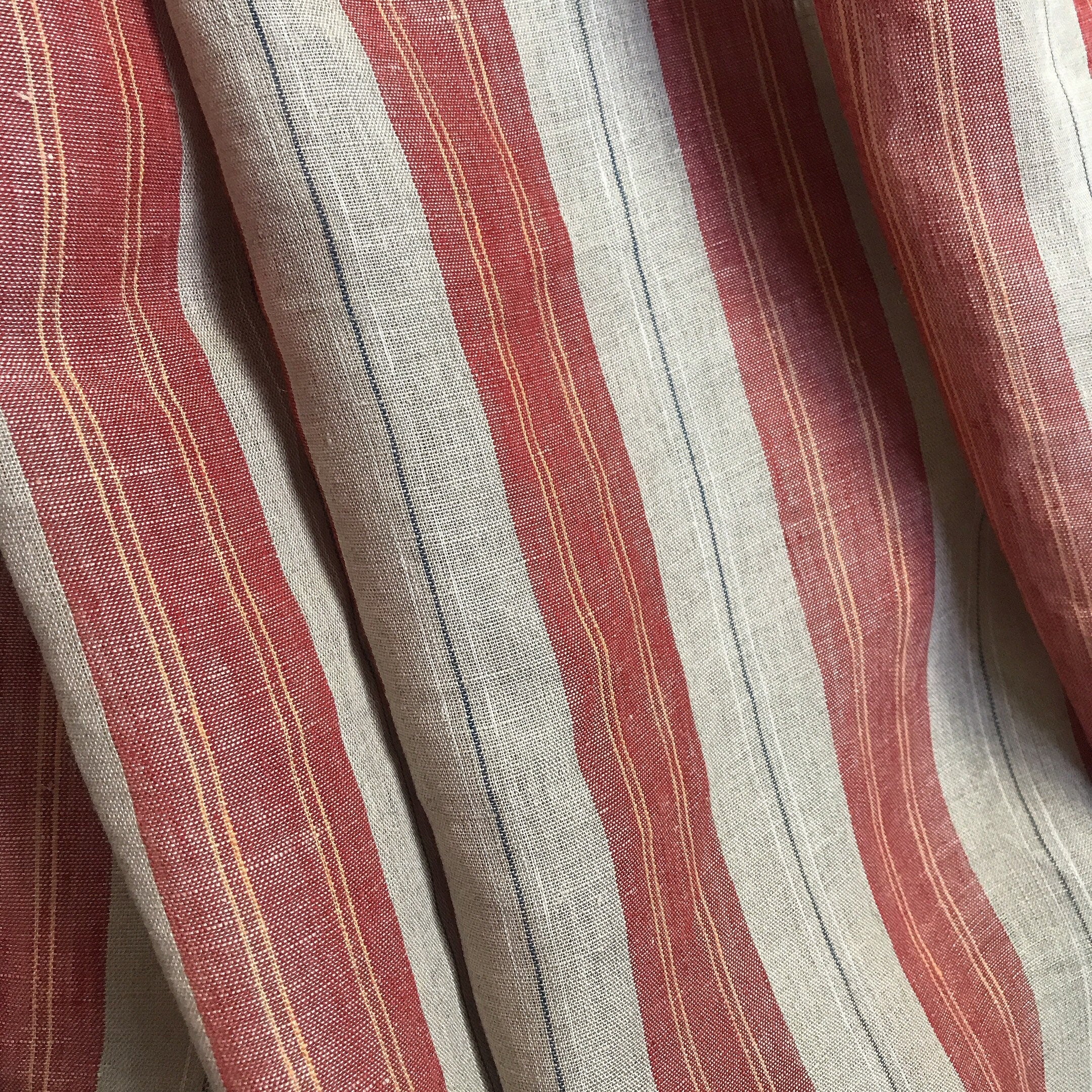Red and Yellow Vertical Stripe Linen Curtain on Natural Beige with Orange Accents