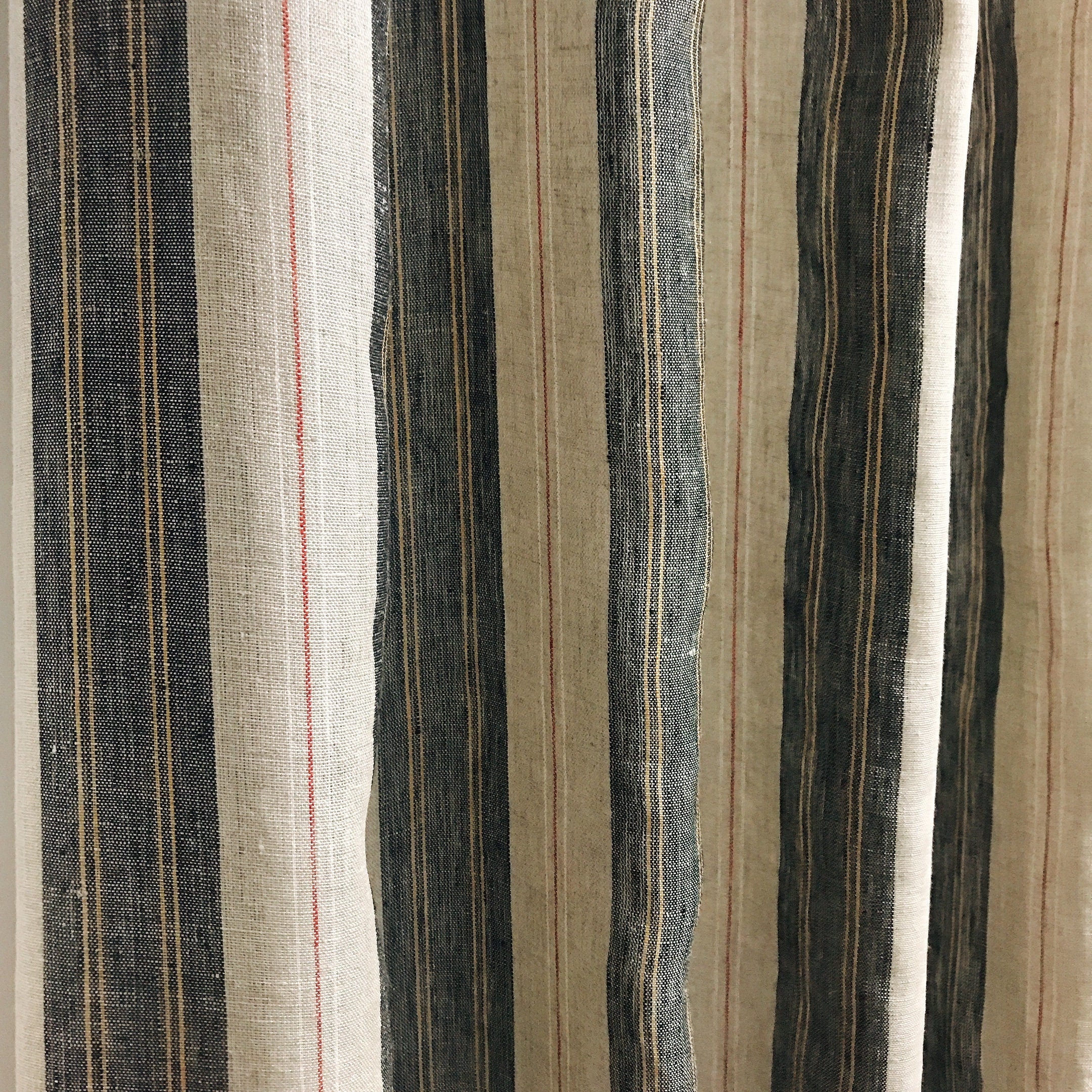 Black Orange Yellow and Red Striped Linen Curtain on Natural Beige