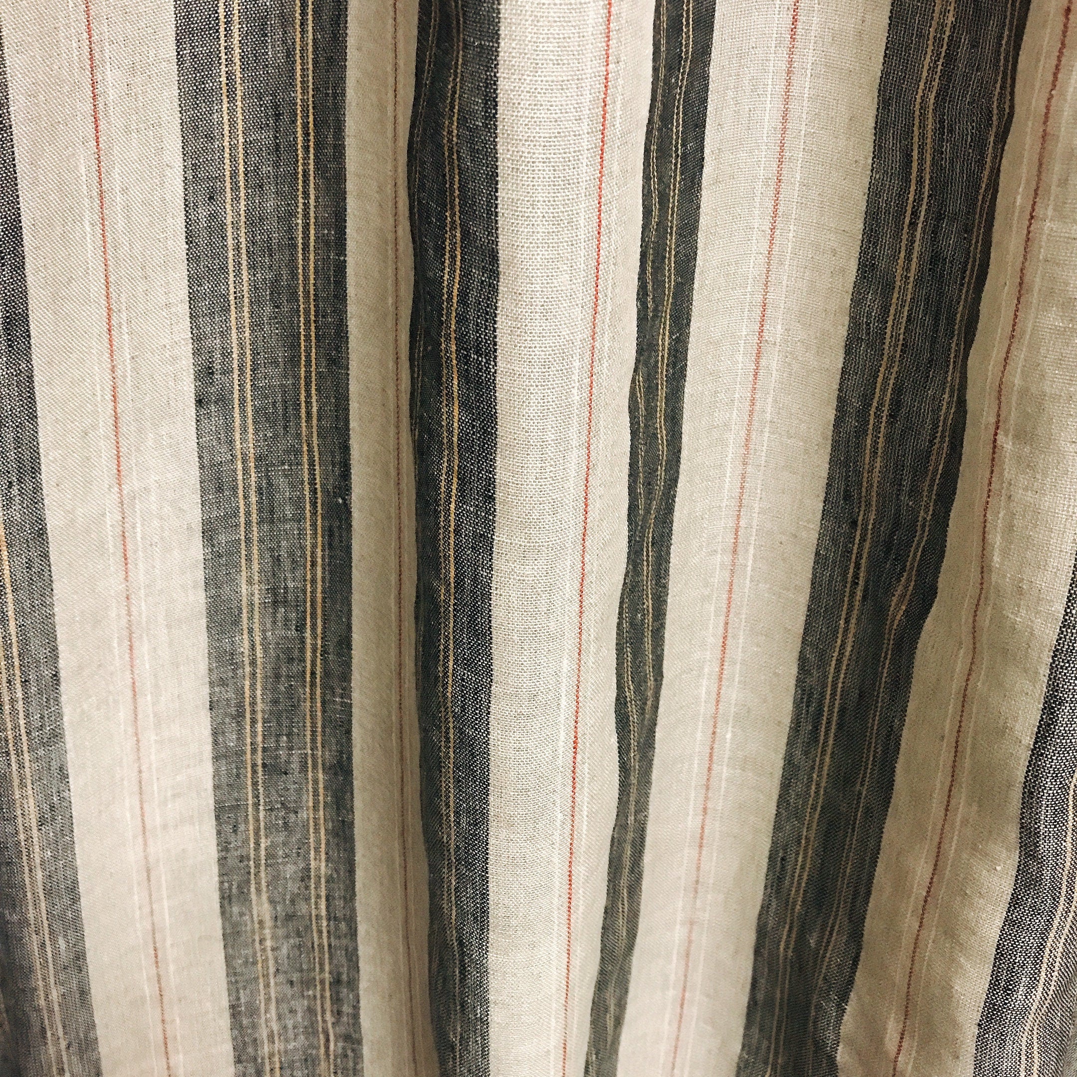 Black Orange Yellow and Red Striped Linen Curtain on Natural Beige