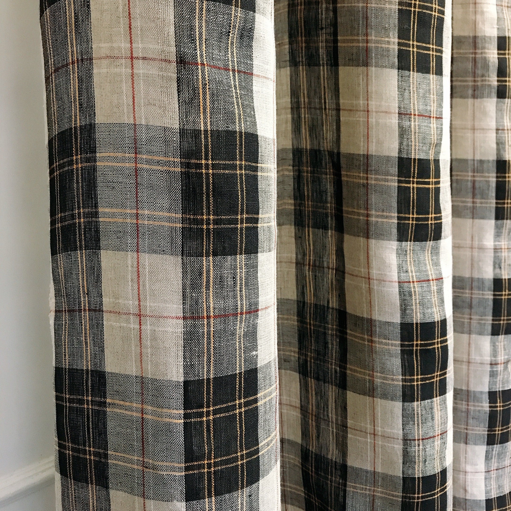 Black Orange Yellow and Red Plaid Linen Curtain on Natural Beige