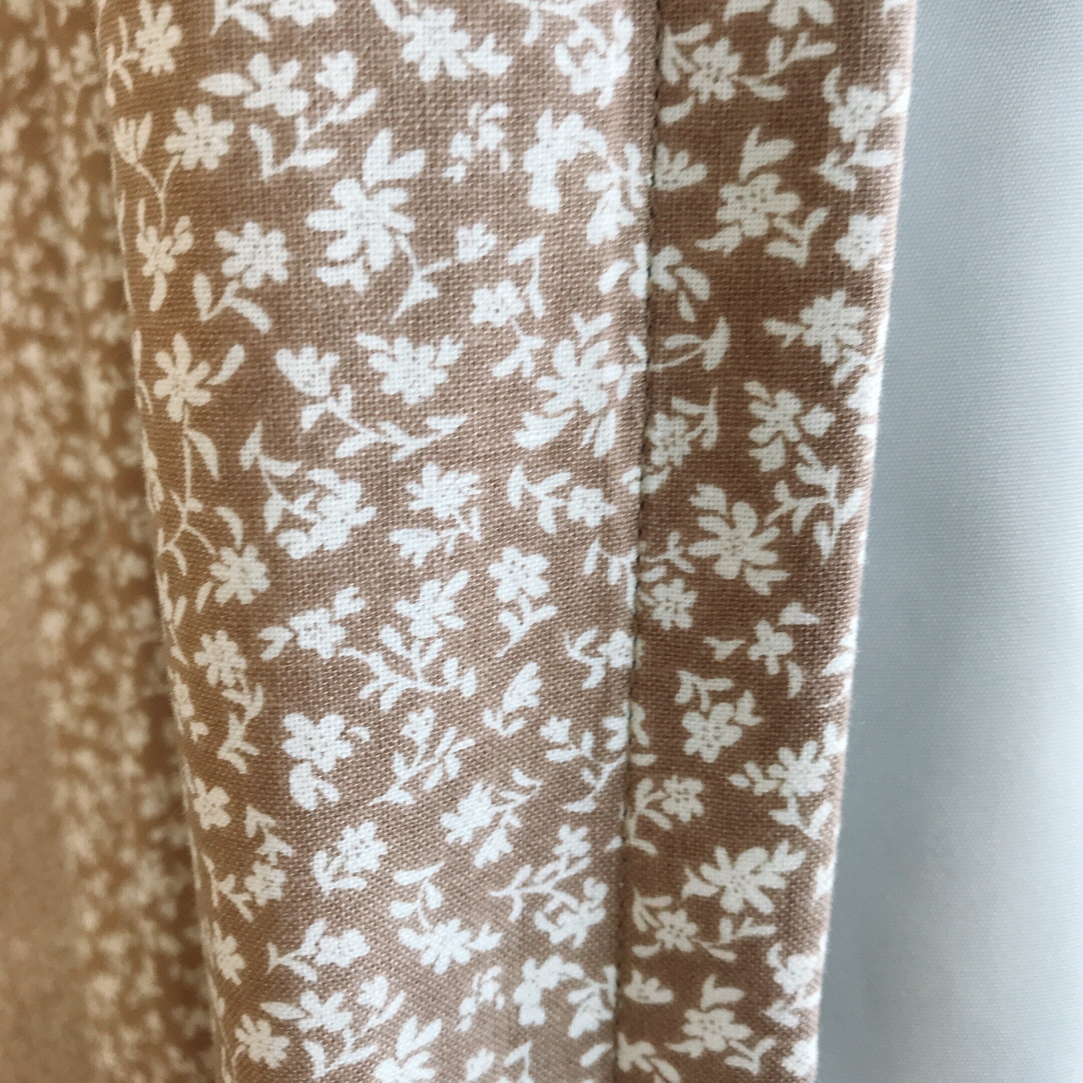 Petite White Floral Curtain on Natural Mocha