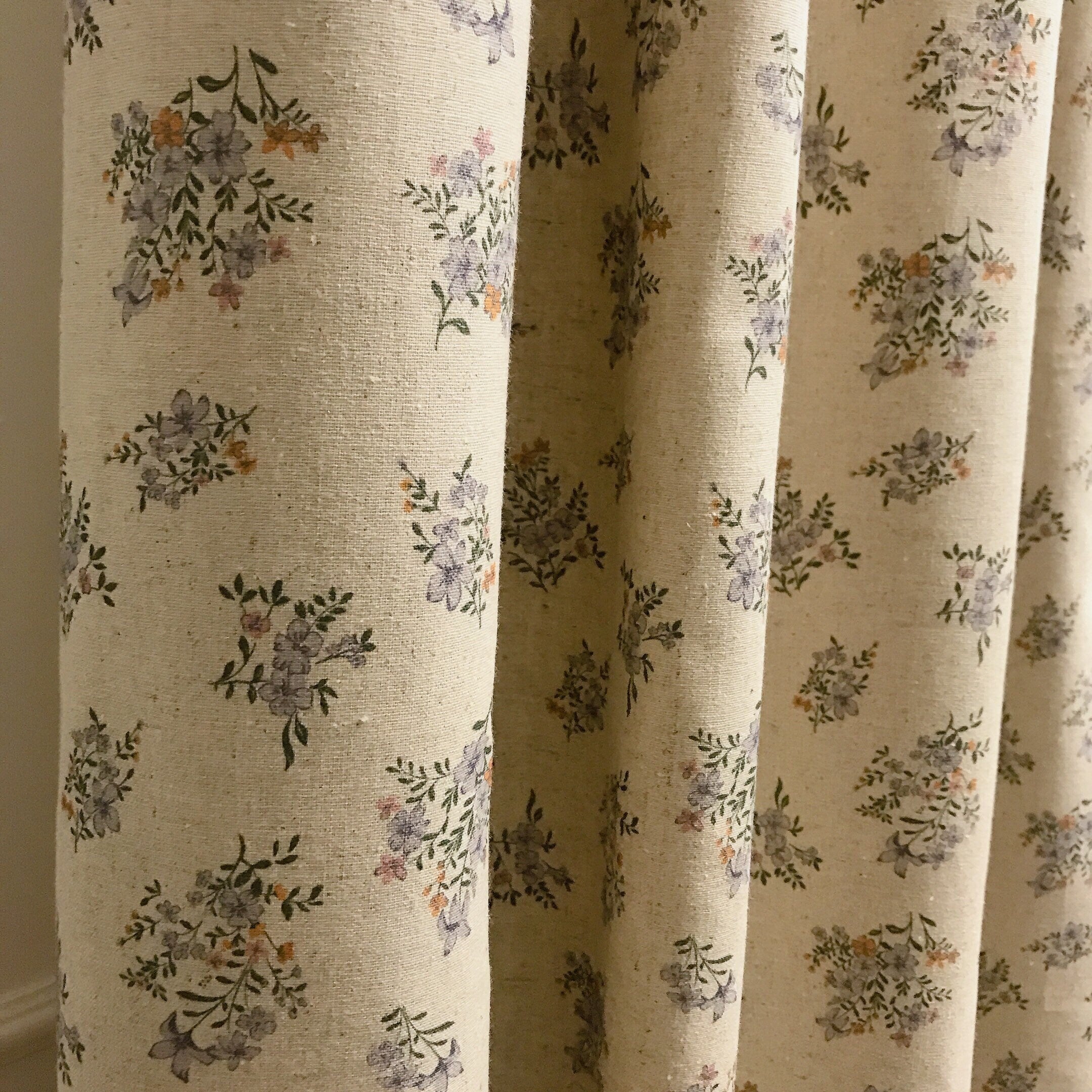 Light Purple and Coral Orange Floral Curtain on Natural Beige