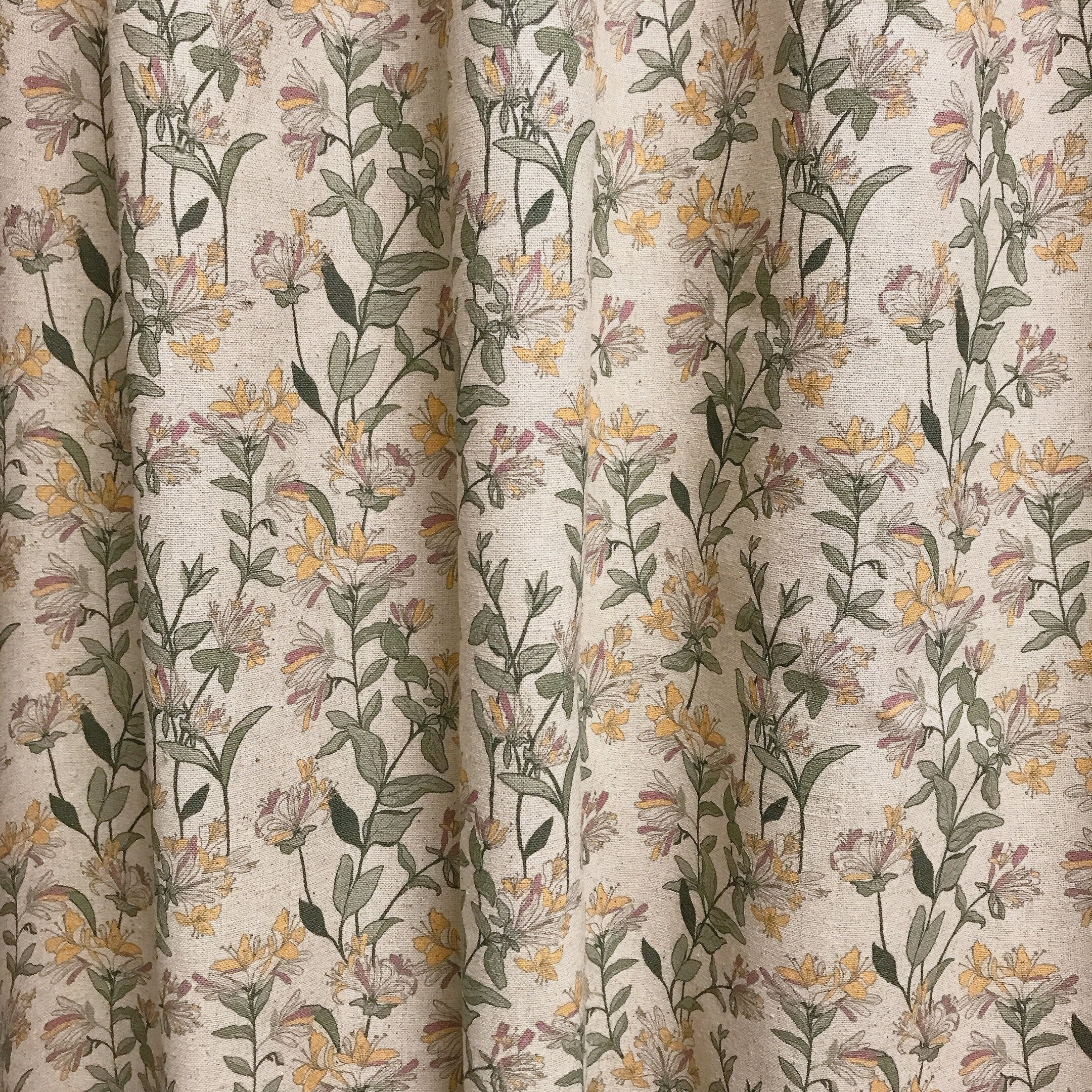 Light Orange and Plum Pink Floral Curtain on Natural Beige