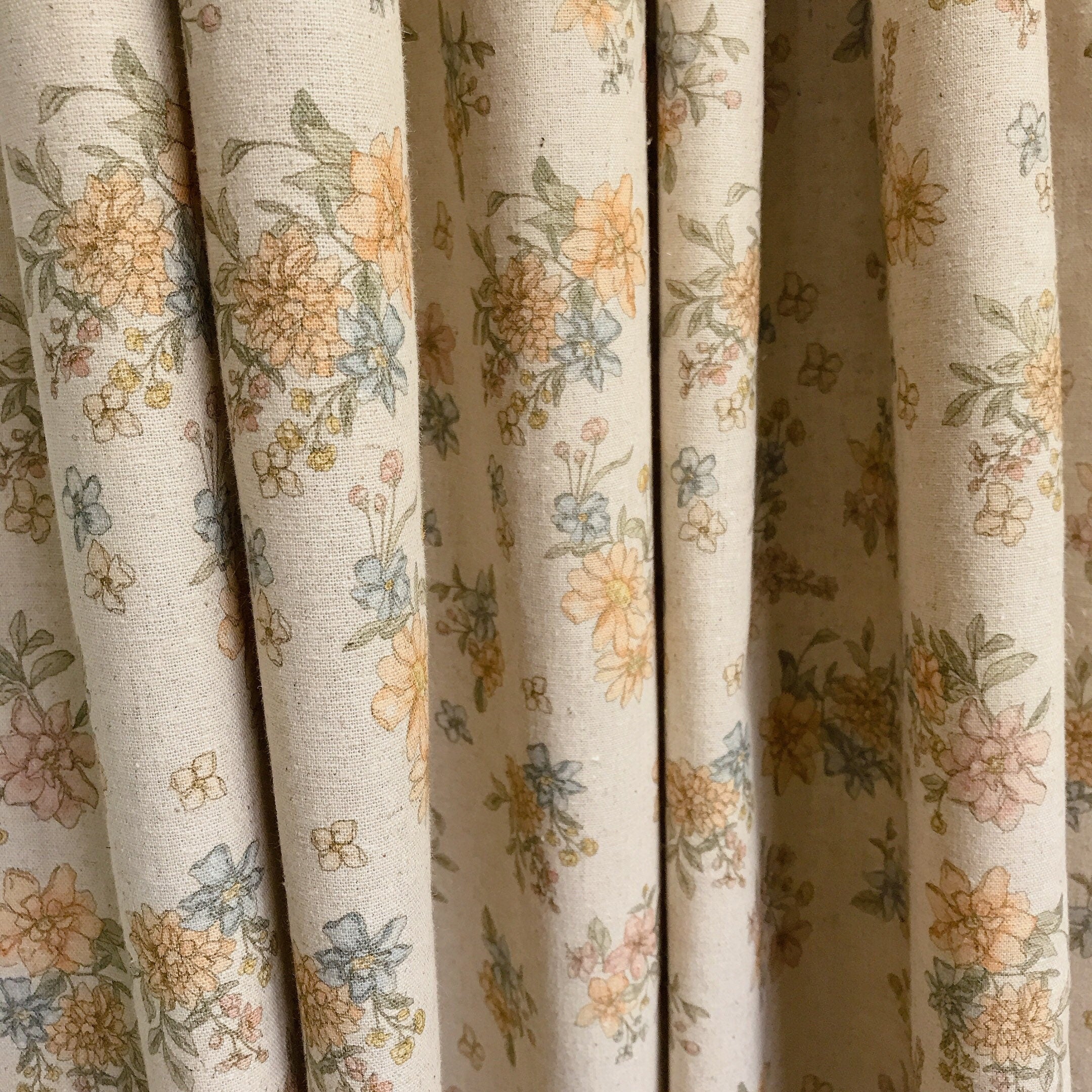 Pale Orange and Light Pink Floral Curtain on Natural Beige
