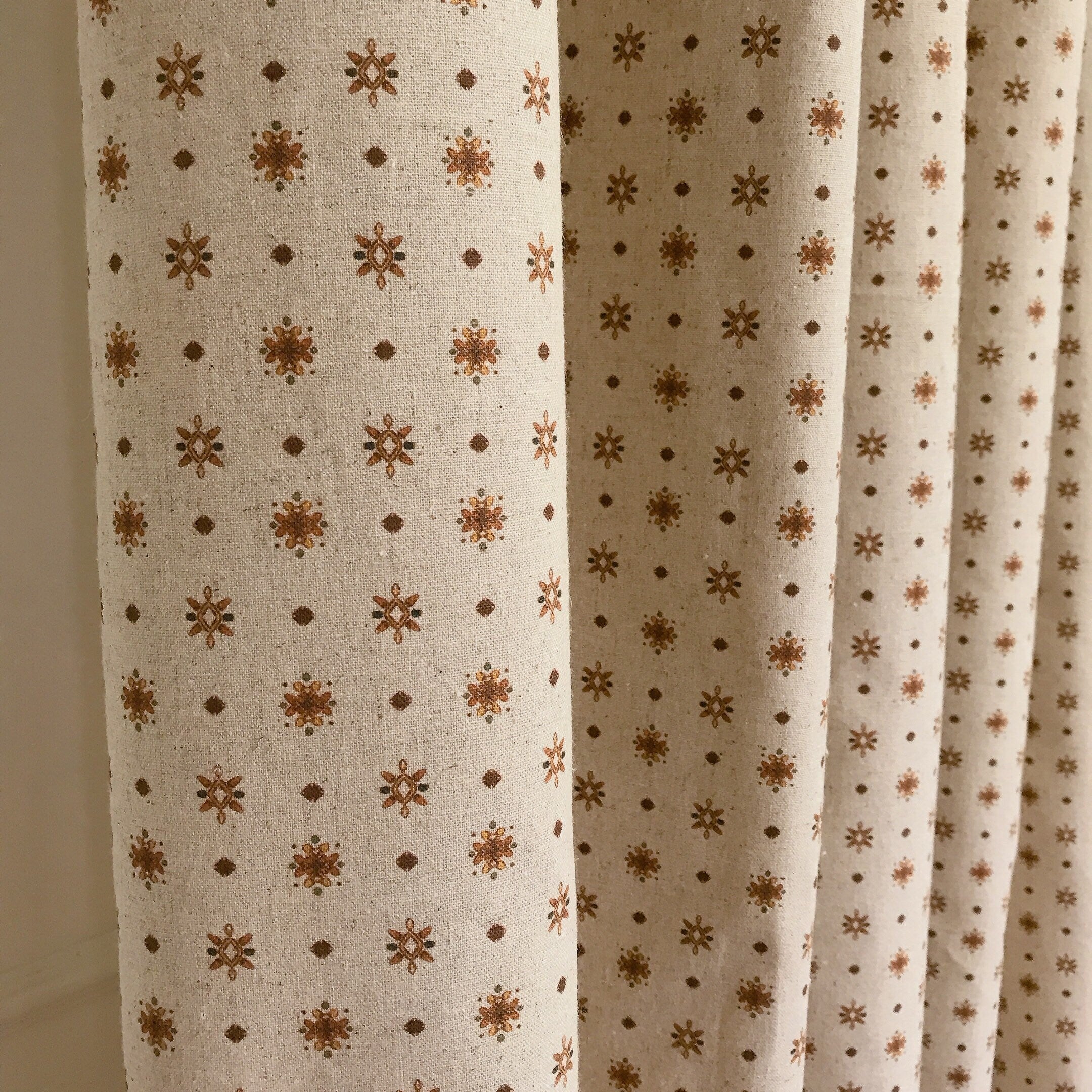 Copper Brown Circle Curtain on Natural Beige