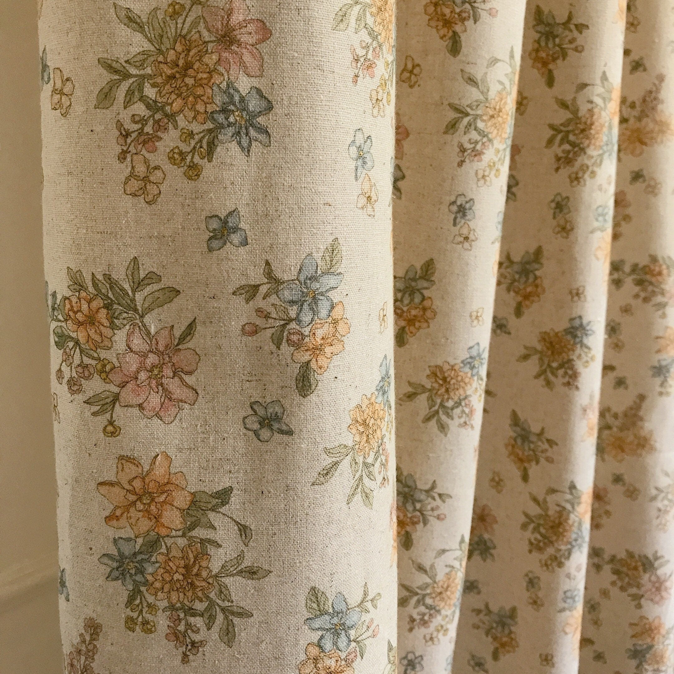 Pale Orange and Light Pink Floral Curtain on Natural Beige