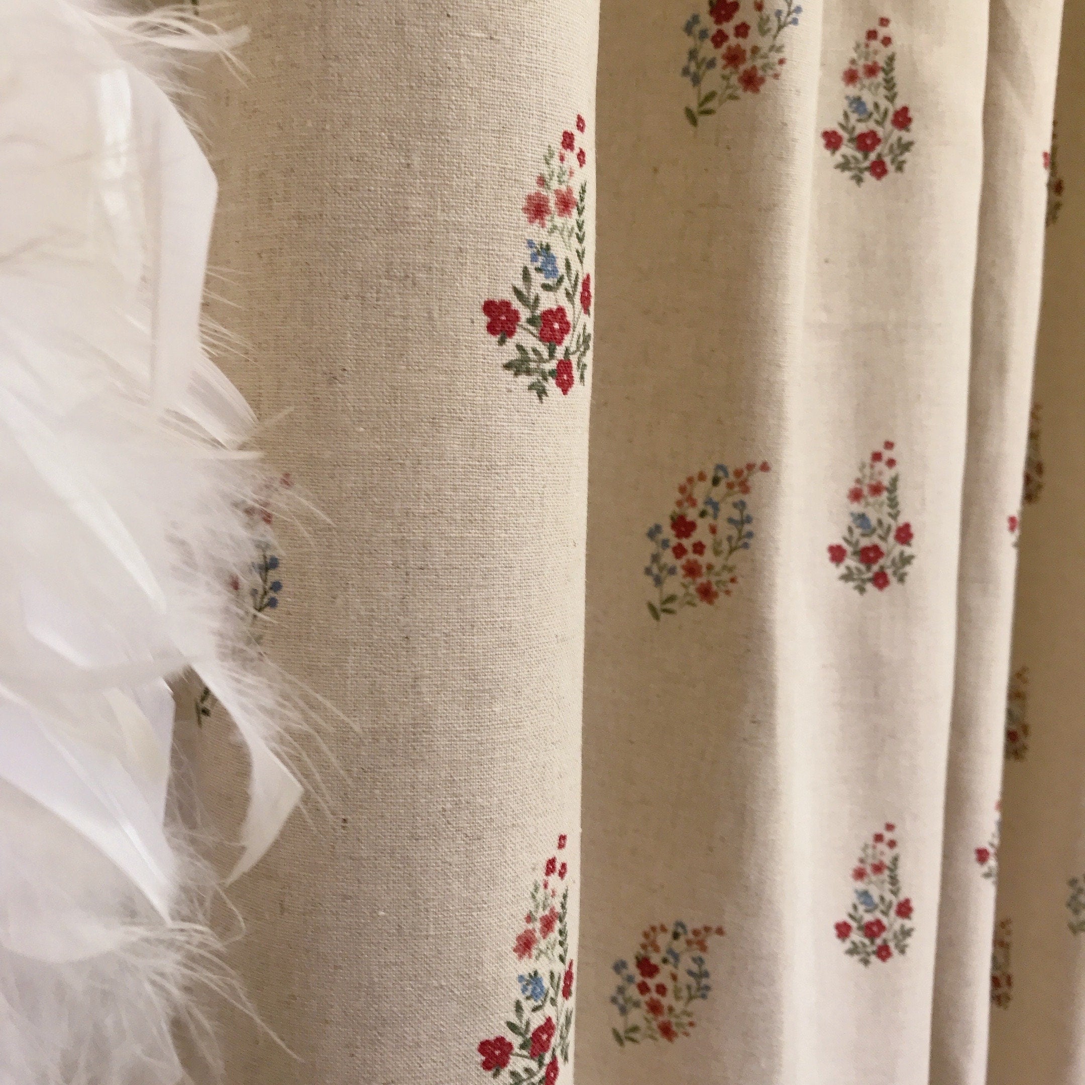 Red and Raspberry Pink Floral Curtain on Natural Beige