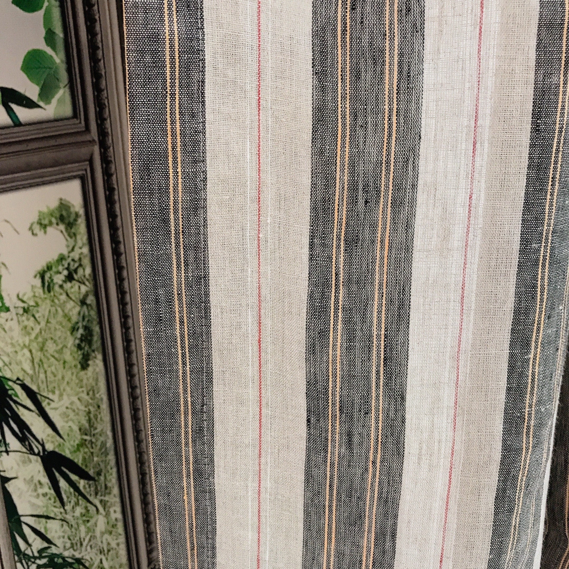 Black Orange Yellow and Red Striped Linen Curtain on Natural Beige