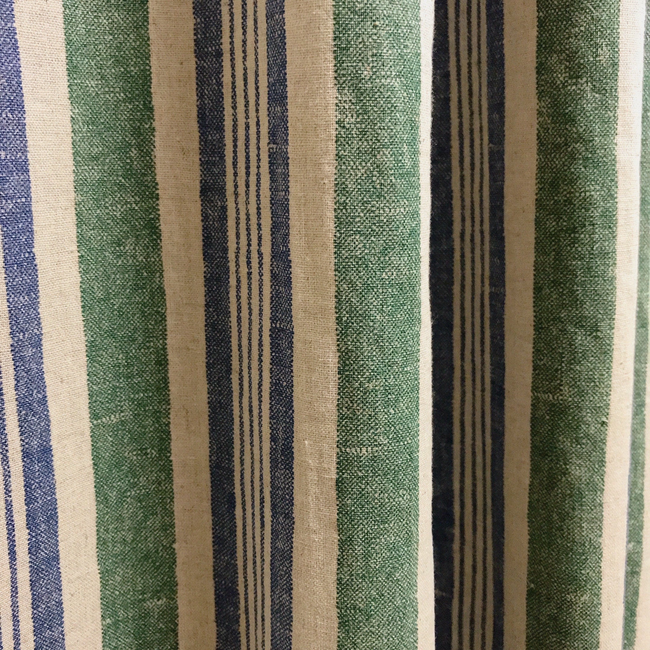 Dusty Forest Green and Blue Stripe Curtain on Natural Beige