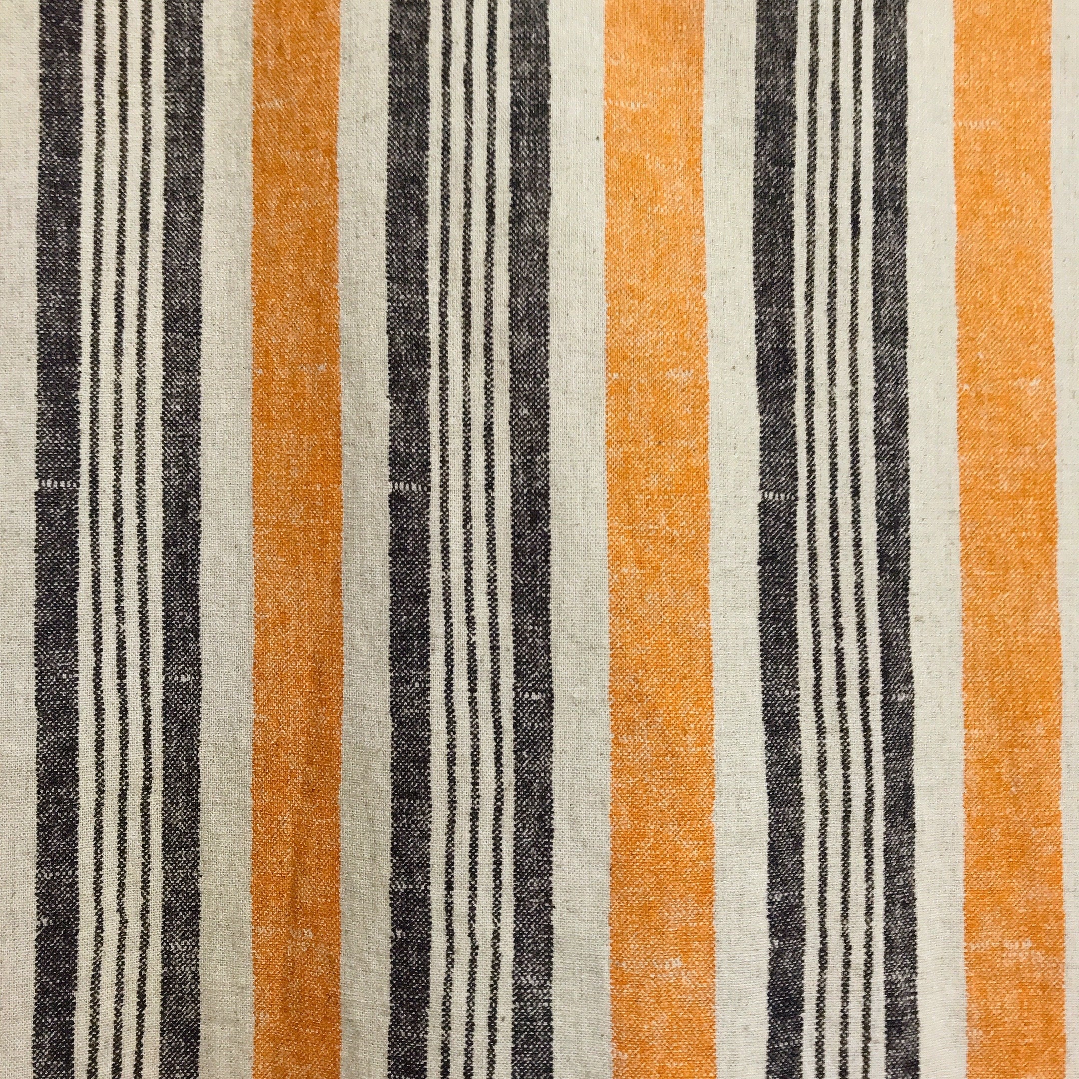 Dusty Orange and Black Stripe Curtain on Natural Beige