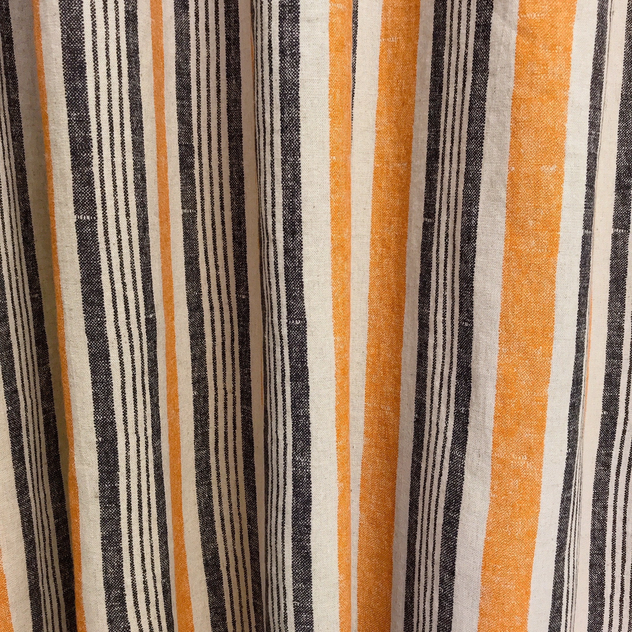 Dusty Orange and Black Stripe Curtain on Natural Beige