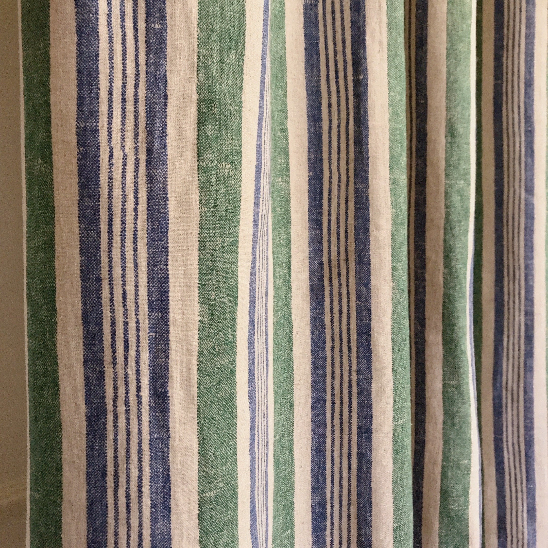 Dusty Forest Green and Blue Stripe Curtain on Natural Beige
