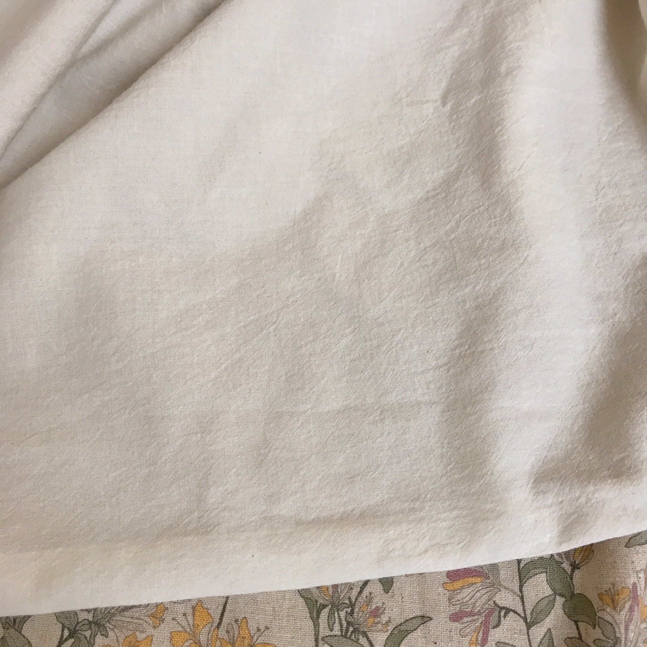 Light Orange and Plum Pink Floral Duvet Cover on Natural Beige