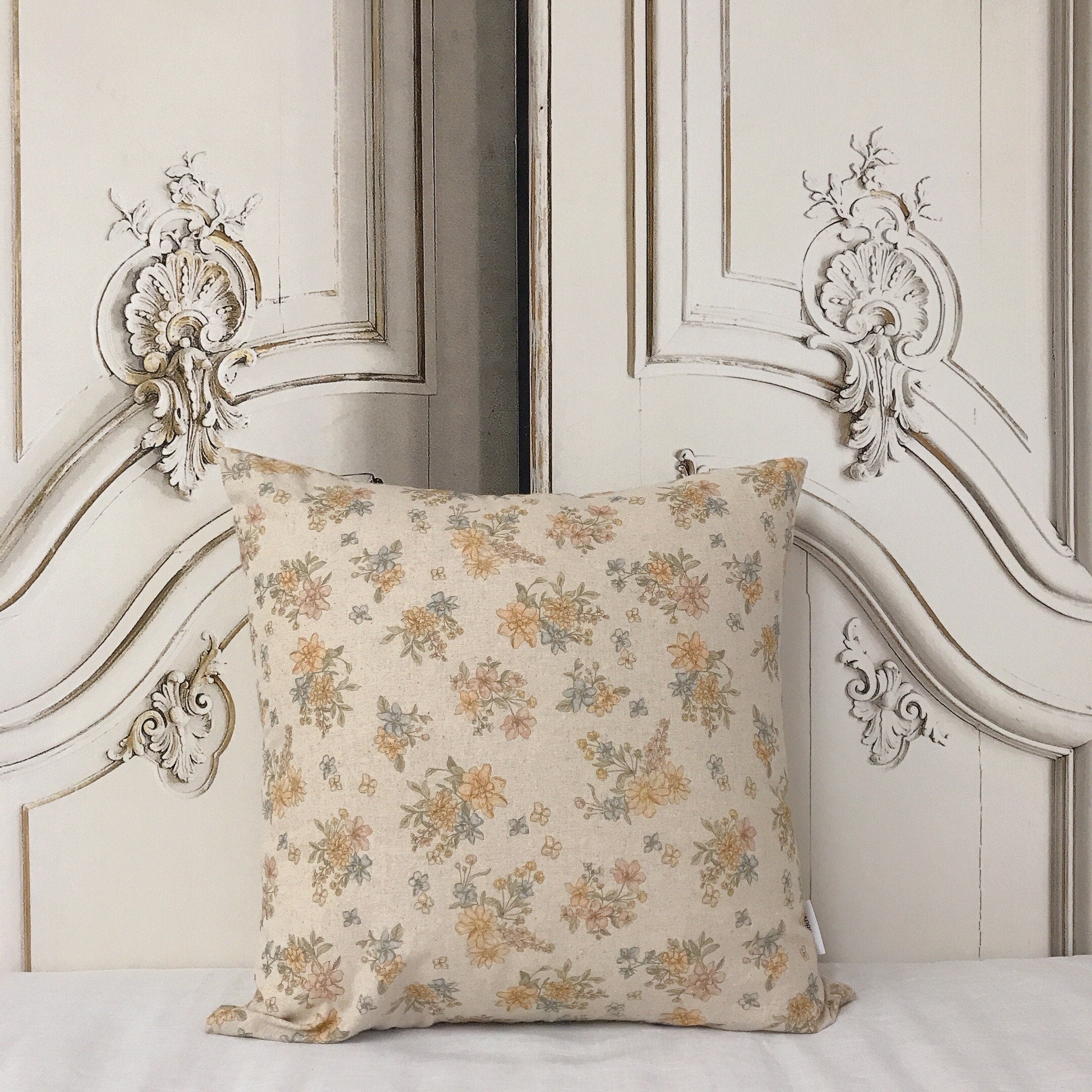 Pale Orange and Light Pink Floral Cushion Cover on Natural Beige