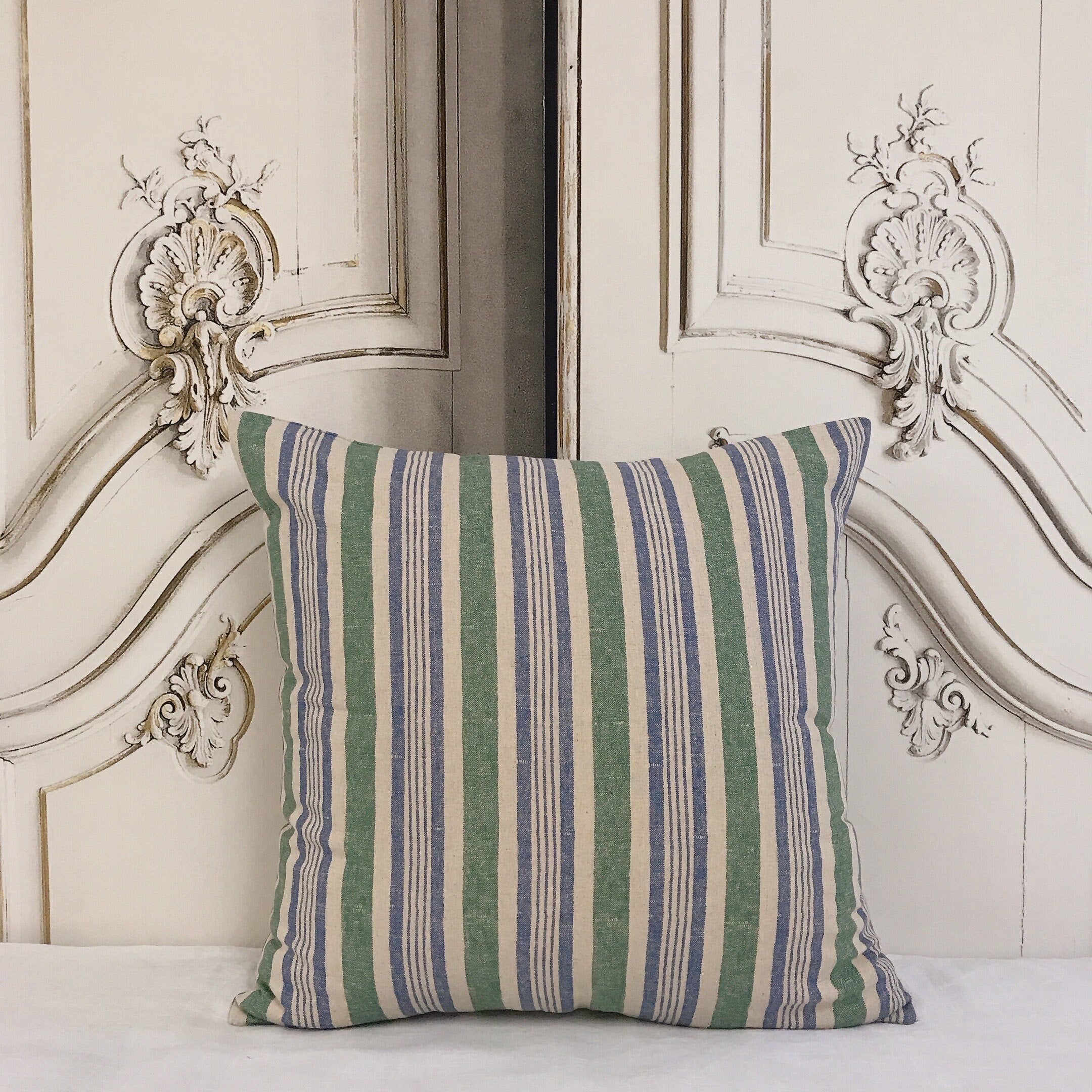 Dusty Forest Green and Blue Stripe Cushion Cover on Natural Beige