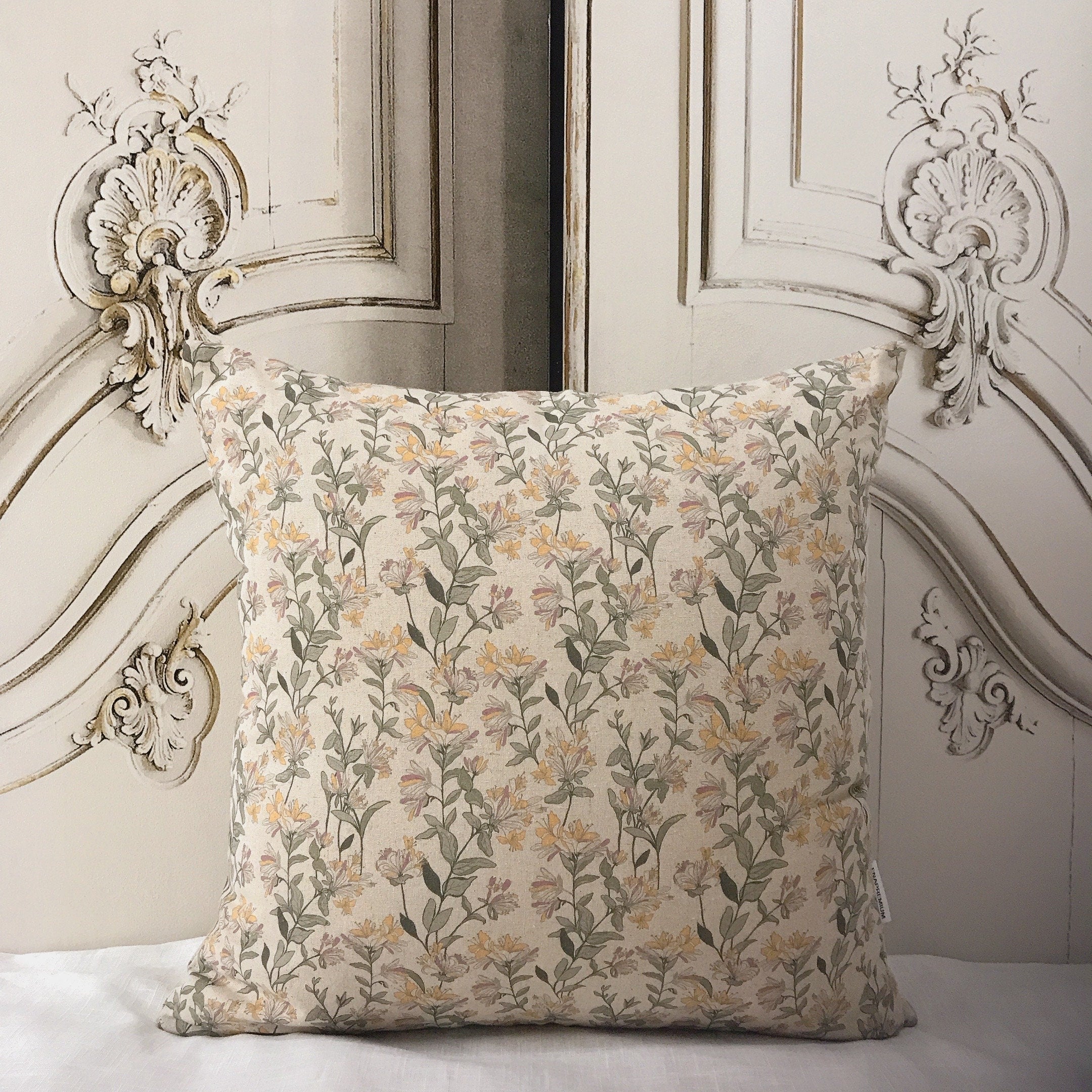 Light Orange and Plum Pink Floral Cushion Cover on Natural Beige