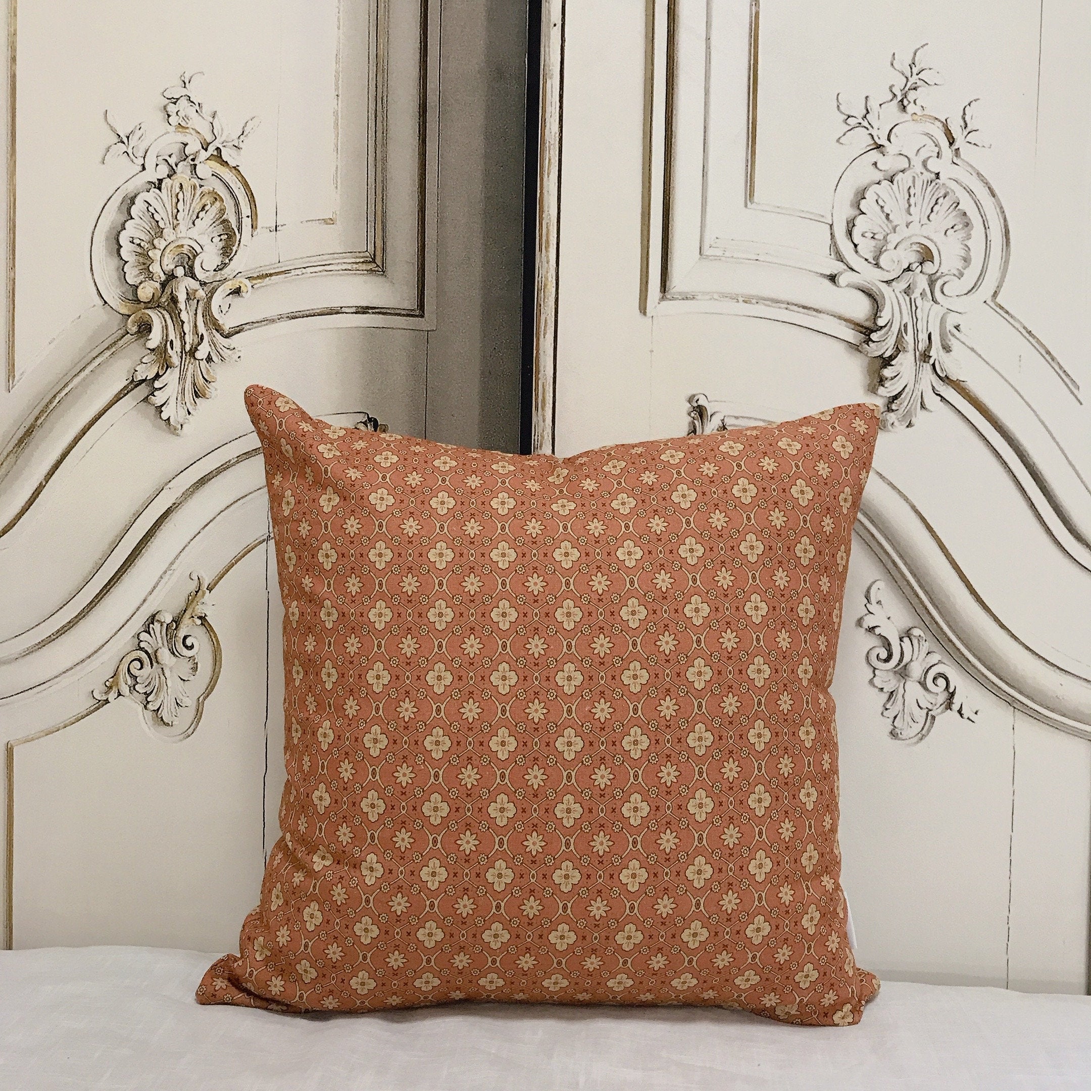 Natural Beige Floral Cushion Cover on Brick