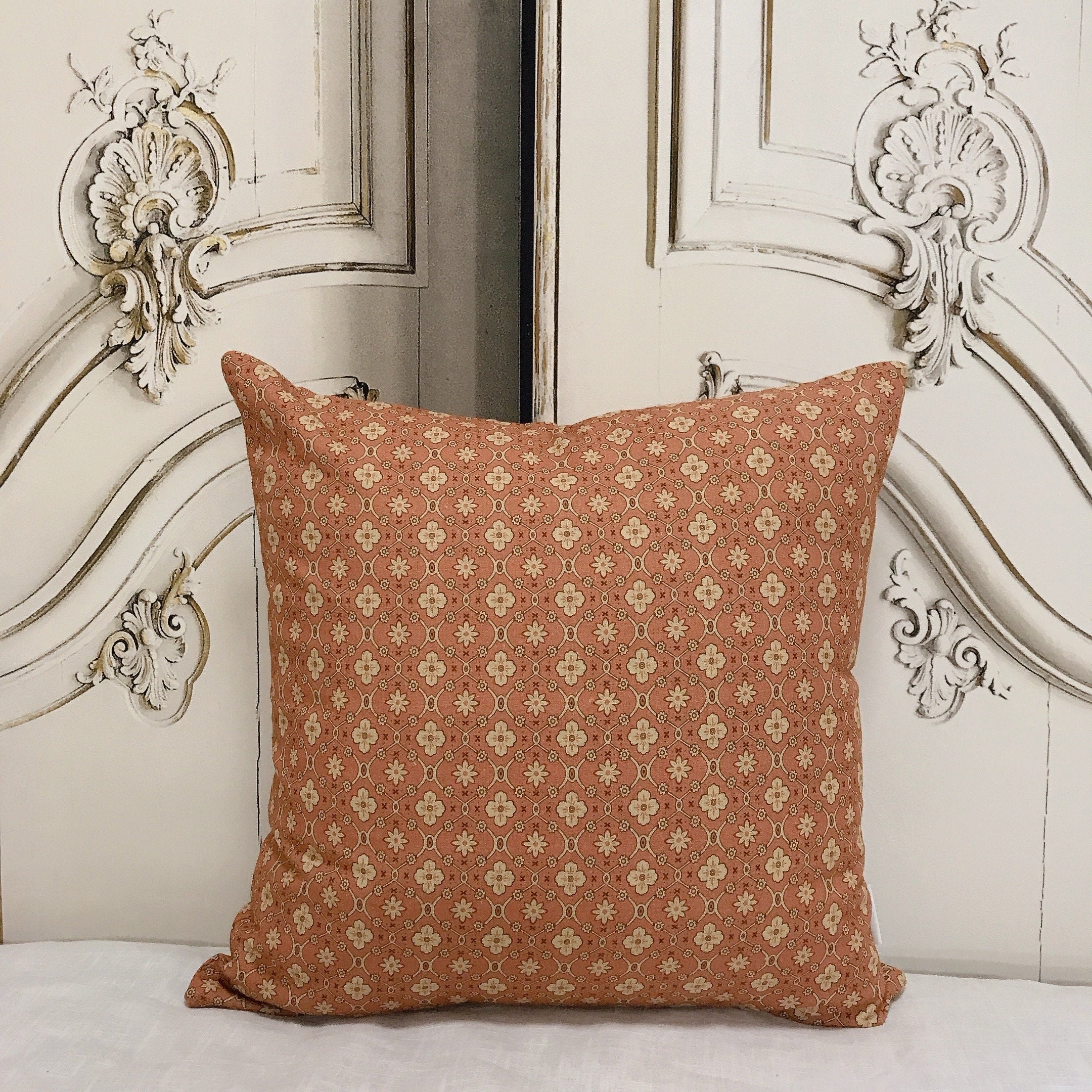 Natural Beige Floral Cushion Cover on Brick