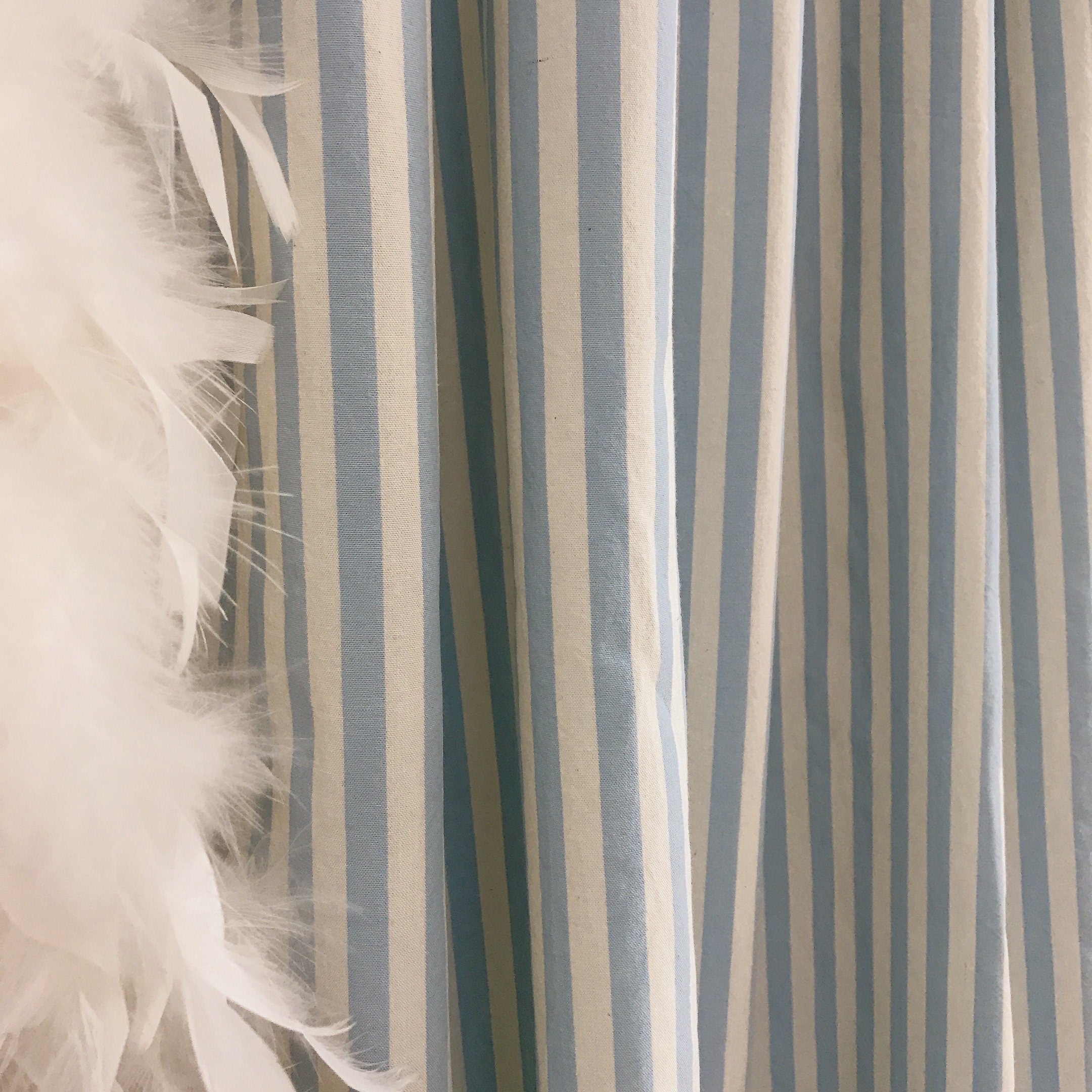 Faded Light Blue Striped Curtain on Ivory