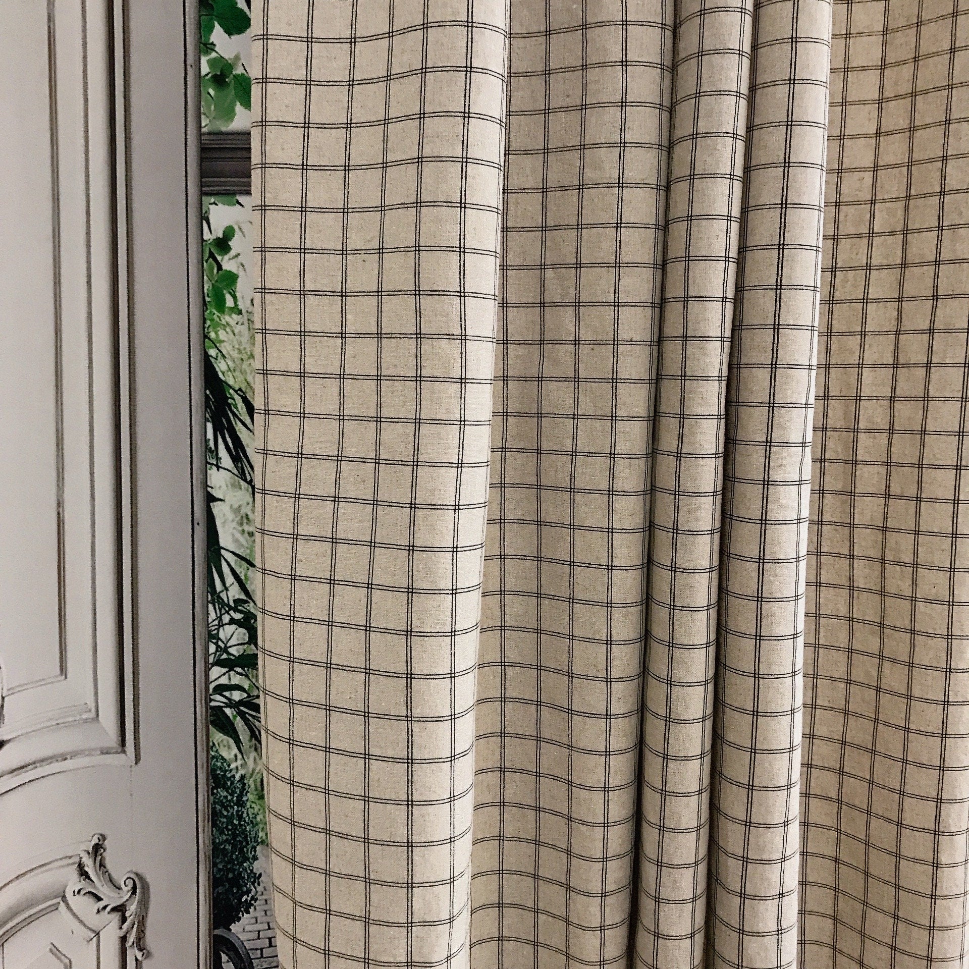 Black Checkerboard Grid Curtain on Natural Beige