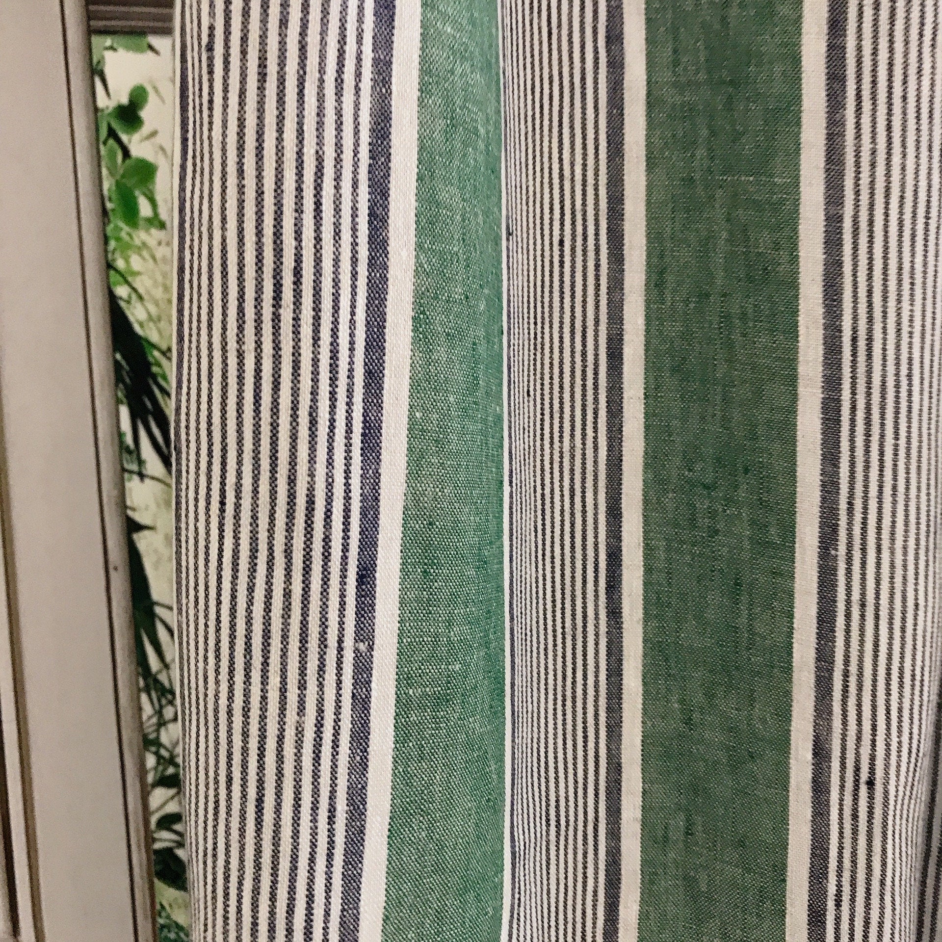 Indigo Blue Vertical Stripe Curtain on Faded Deep Green