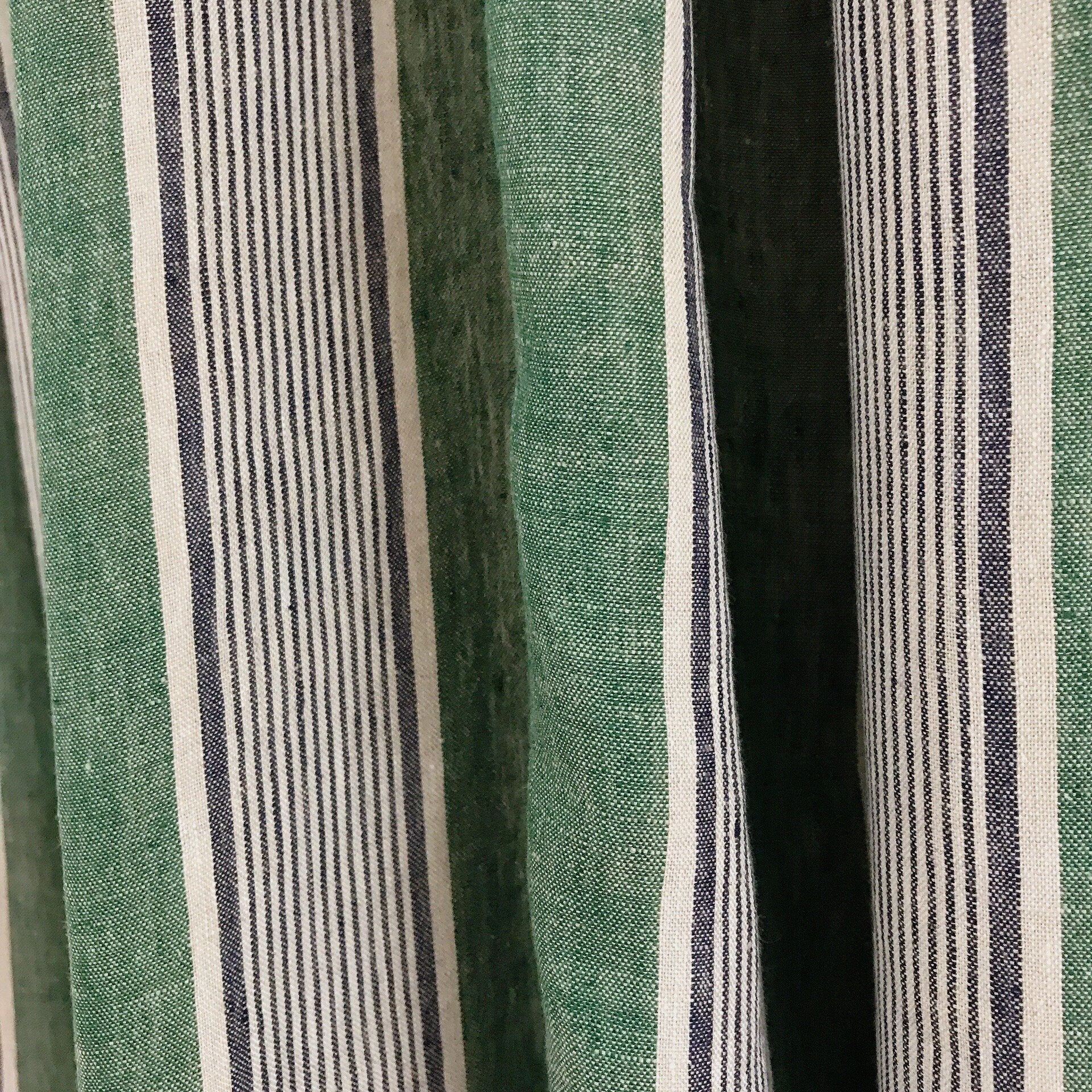 Indigo Blue Vertical Stripe Curtain on Faded Deep Green