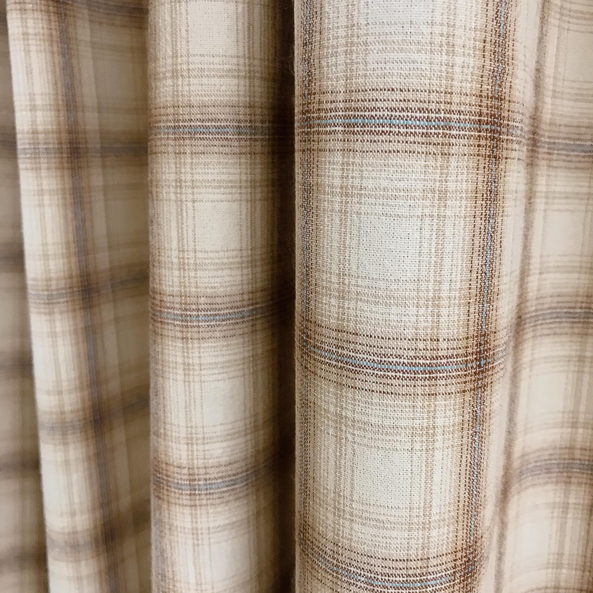 Brown and Blue Plaid Curtain on Natural Beige