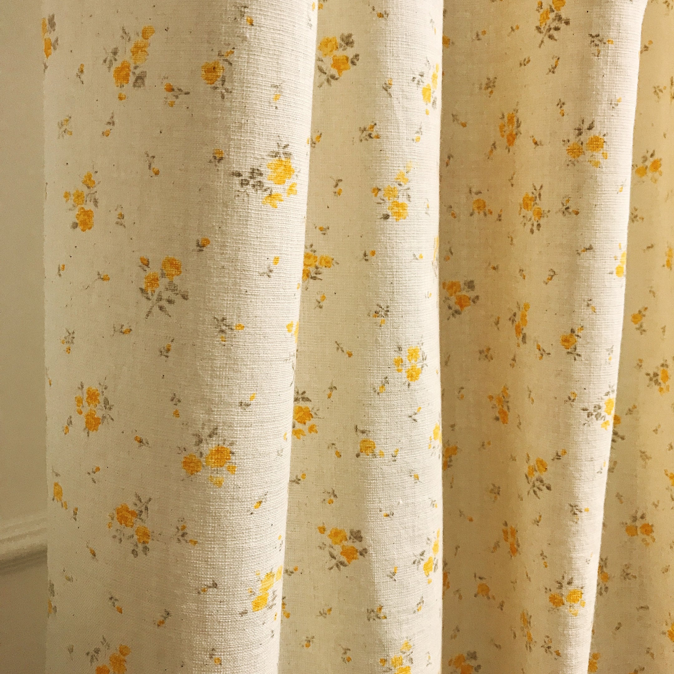 Pale Orange Yellow Floral Curtain on Natural Beige