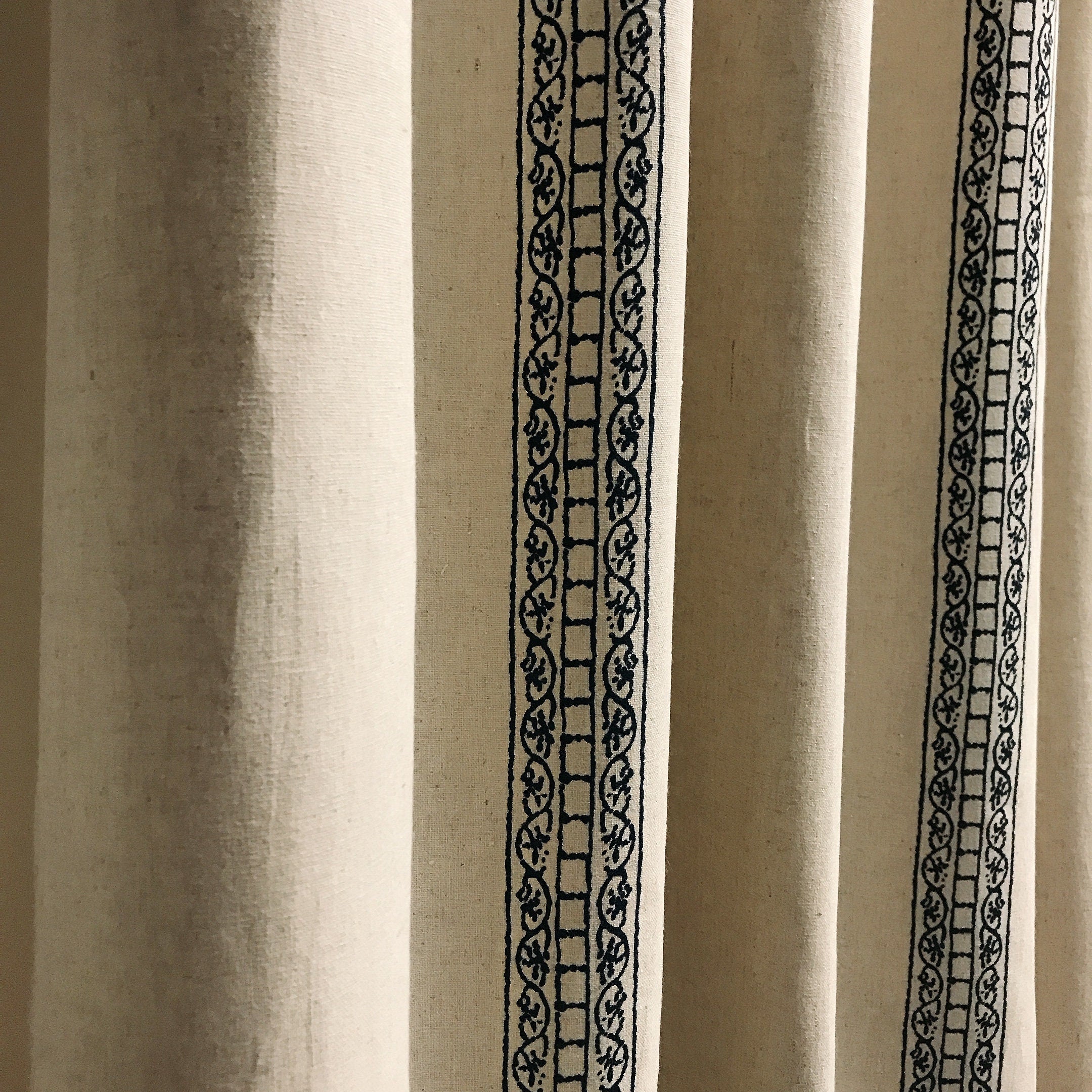 Navy Blue Motif Curtain on Natural Beige