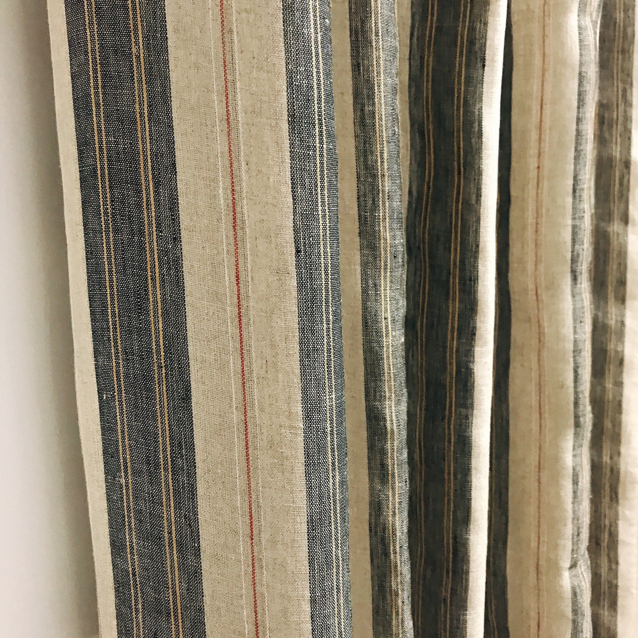 Black Orange Yellow and Red Striped Linen Curtain on Natural Beige