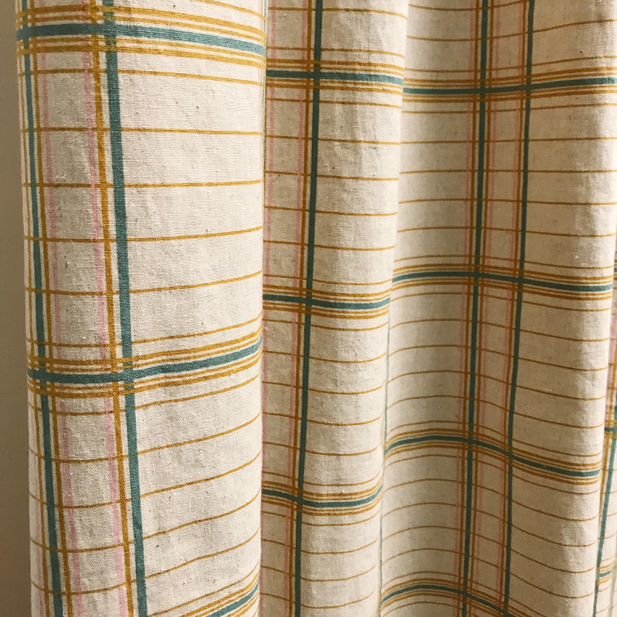 Mustard Teal and Baby Pink Plaid Curtain on Natural Beige