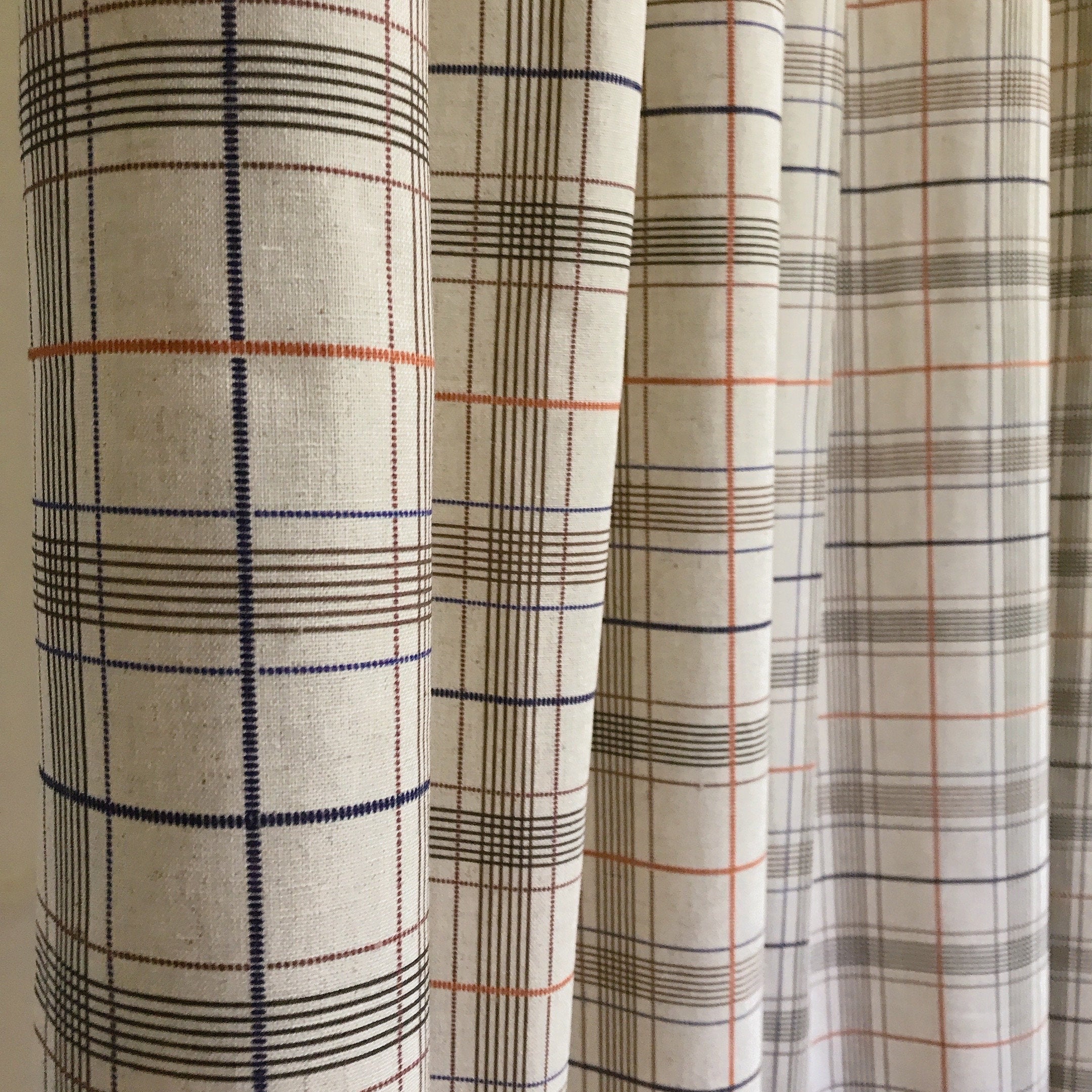 Orange Brown and Indigo Blue Plaid Curtain on Natural Beige