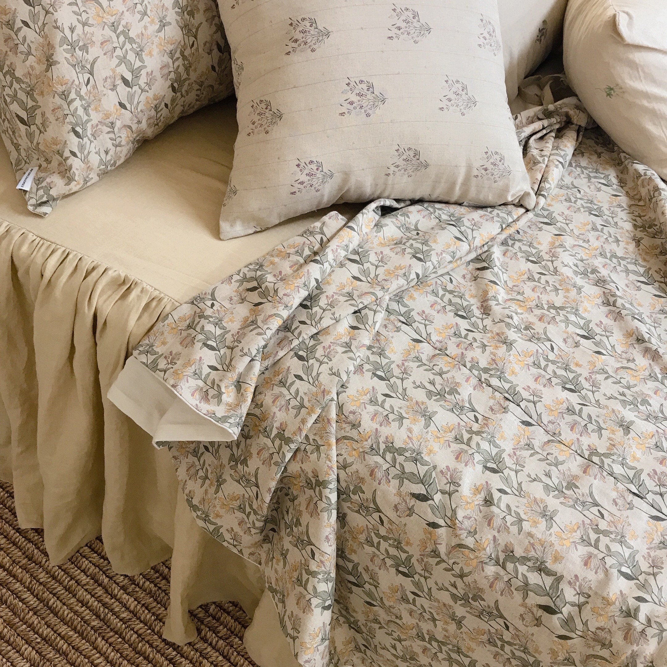 Light Orange and Plum Pink Floral Duvet Cover on Natural Beige