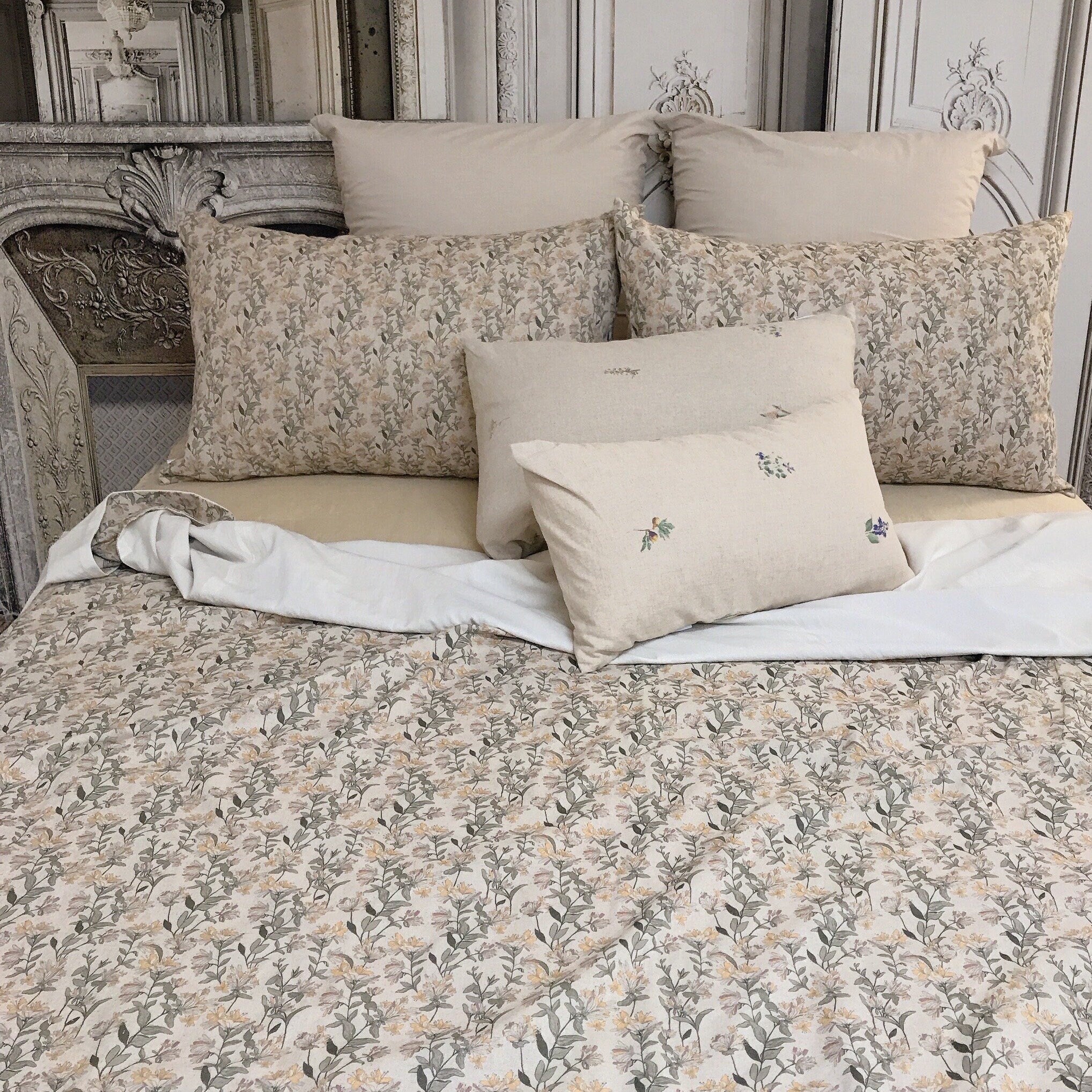 Light Orange and Plum Pink Floral Duvet Cover on Natural Beige