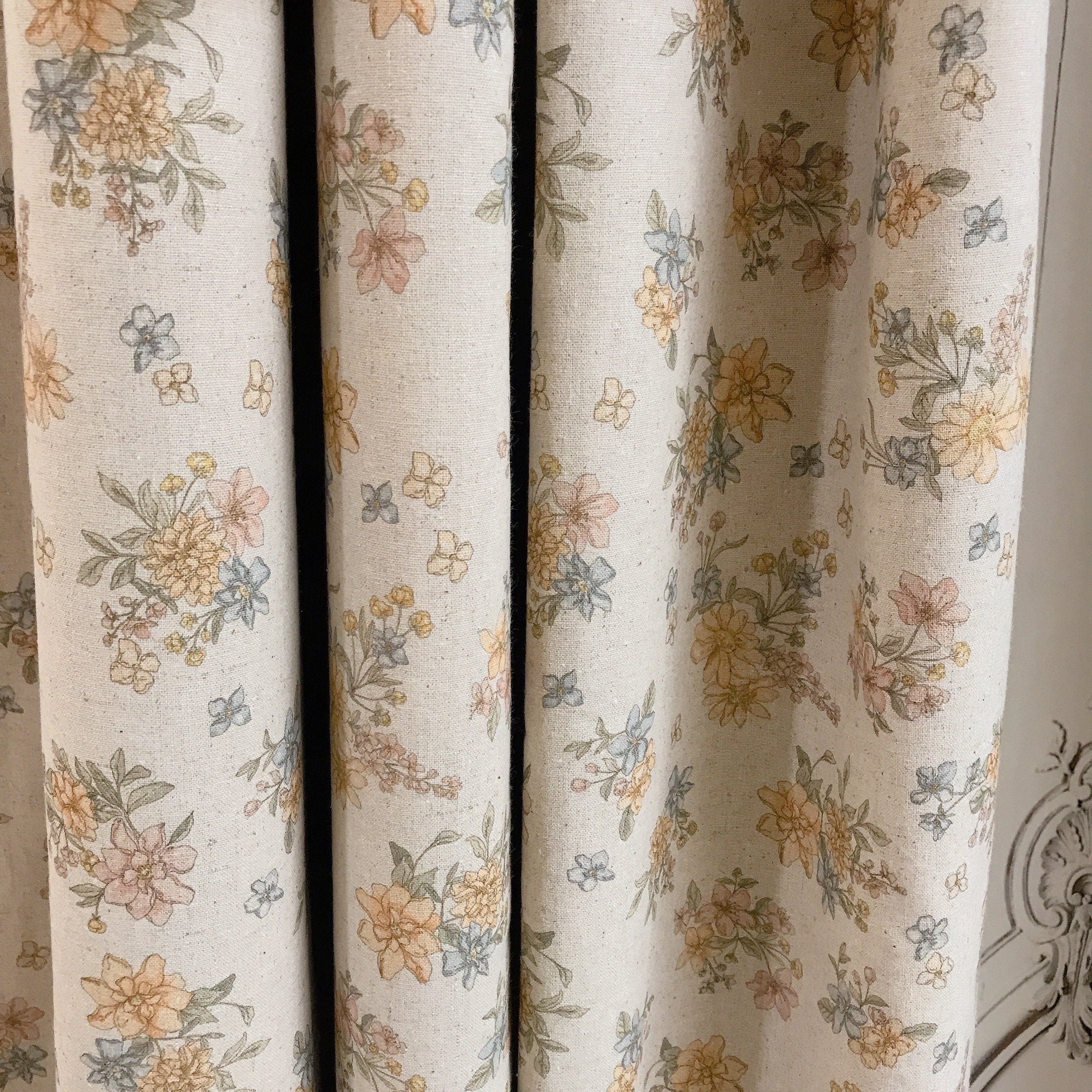 Pale Orange and Light Pink Floral Curtain on Natural Beige
