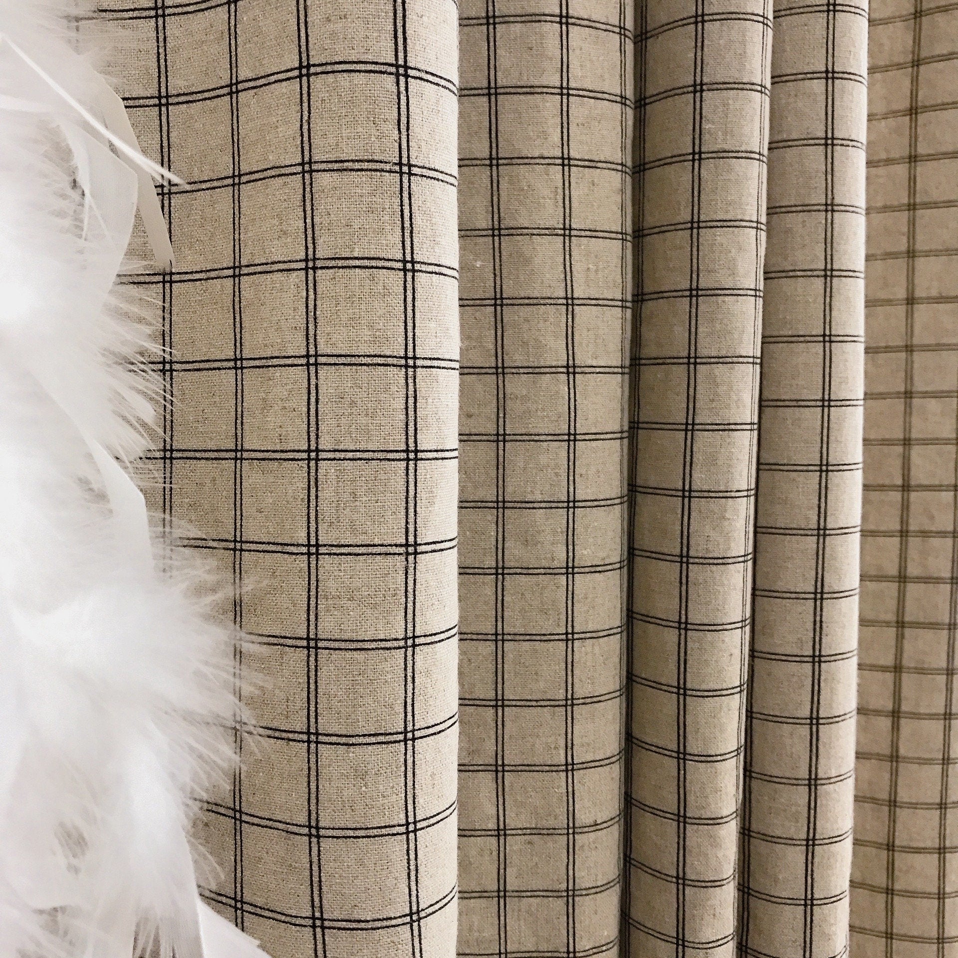 Black Checkerboard Grid Curtain on Natural Beige